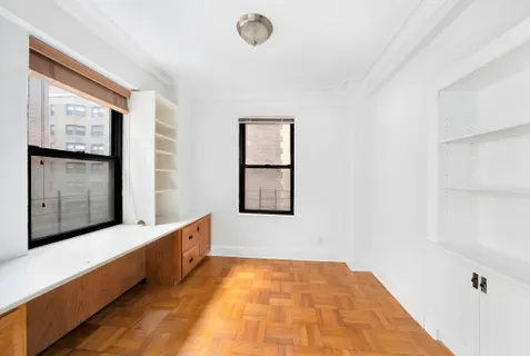 a room with window and gate