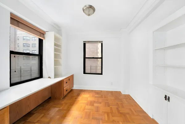 a room with window and gate