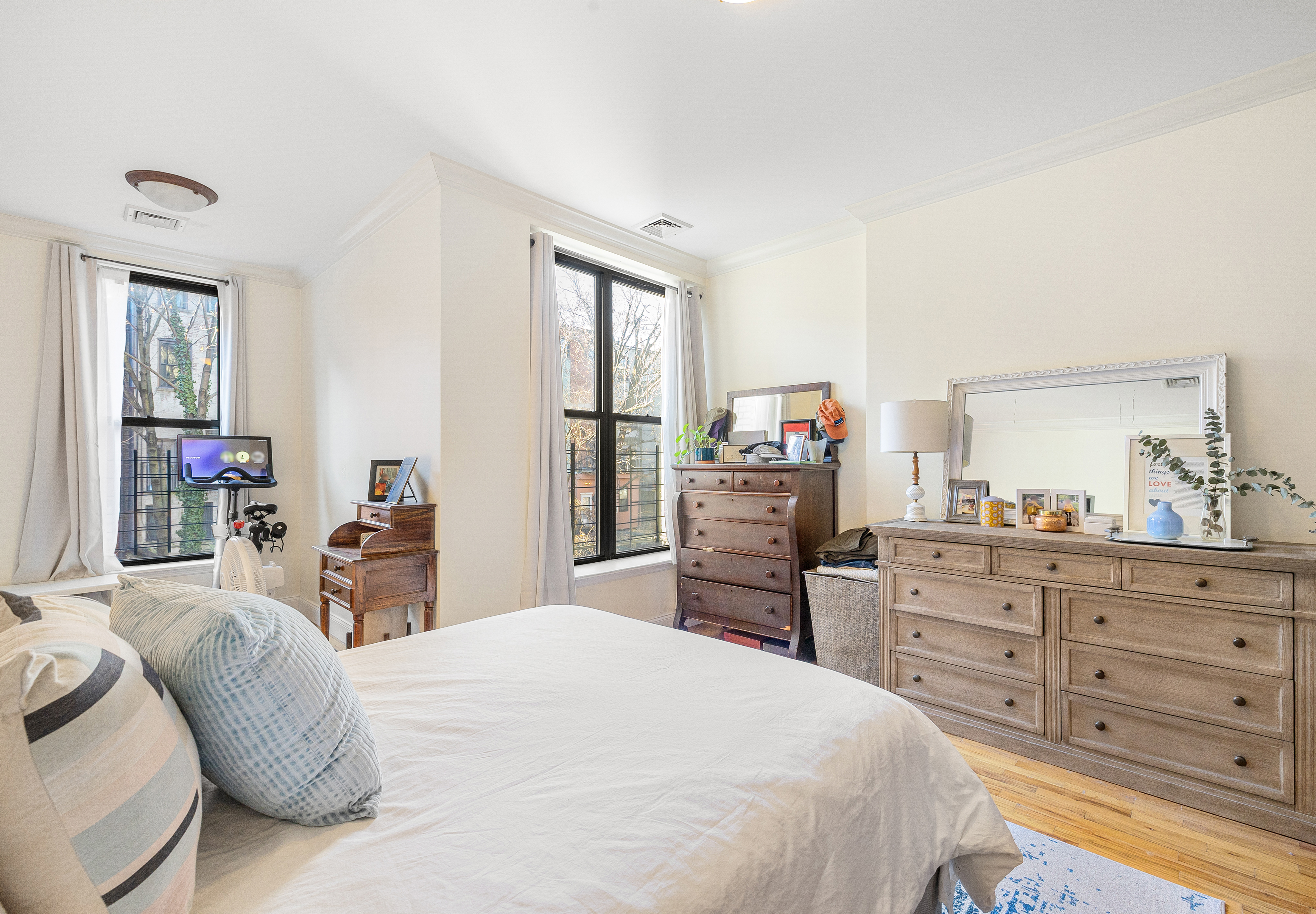 518 West 149th Street Manhattan, NY 10031 - Photo 4 of 23 a bedroom with a bed and furniture