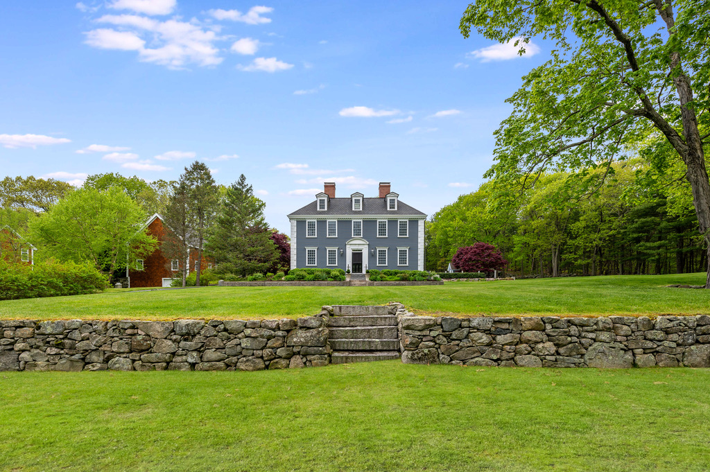 79 Pine Street Dover, MA 02030 - Photo 25 of 25 a front view of a house with a yard