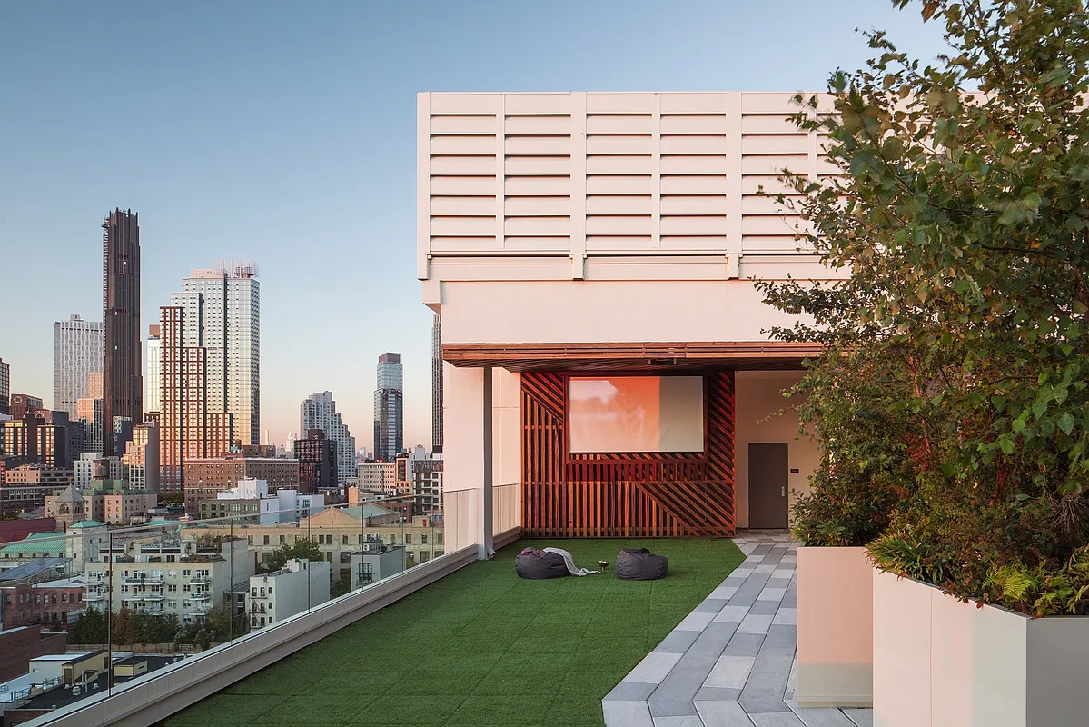 58 St Marks Place, Unit 608 Brooklyn, NY 11217 - Photo 16 of 22 a front view of a house with garden