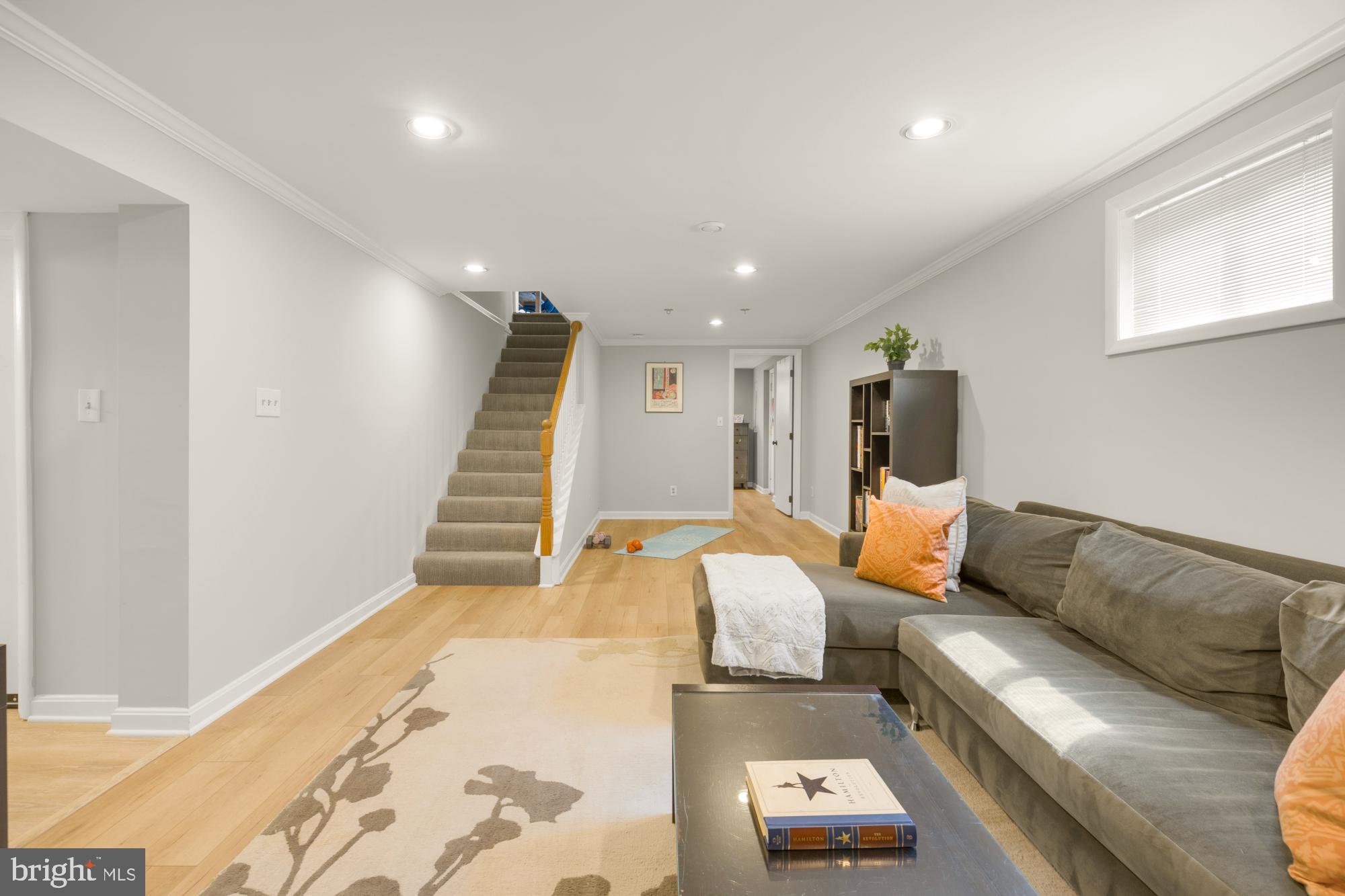 2611 Ross Road Chevy Chase, MD 20815 - Photo 23 of 37 a living room with furniture and a wooden floor
