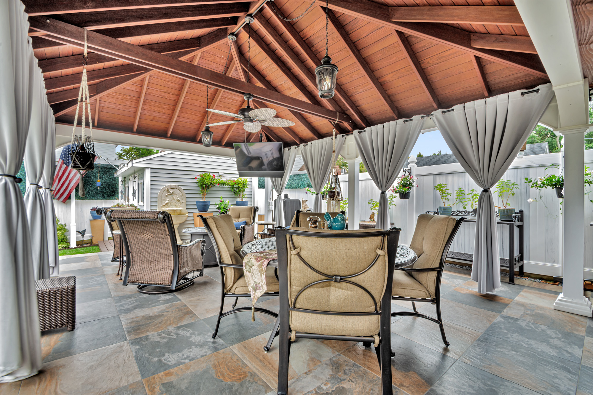 909 Jewett Avenue Staten Island, NY 10314 - Photo 60 of 65 a view of an outdoor space with a table and chairs