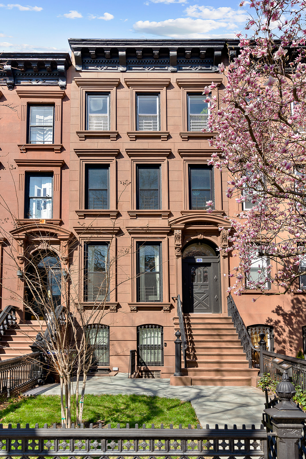 15 3rd Place, Unit 2 Brooklyn, NY 11231 - Photo 2 of 14 a front view of a residential apartment building with a yard