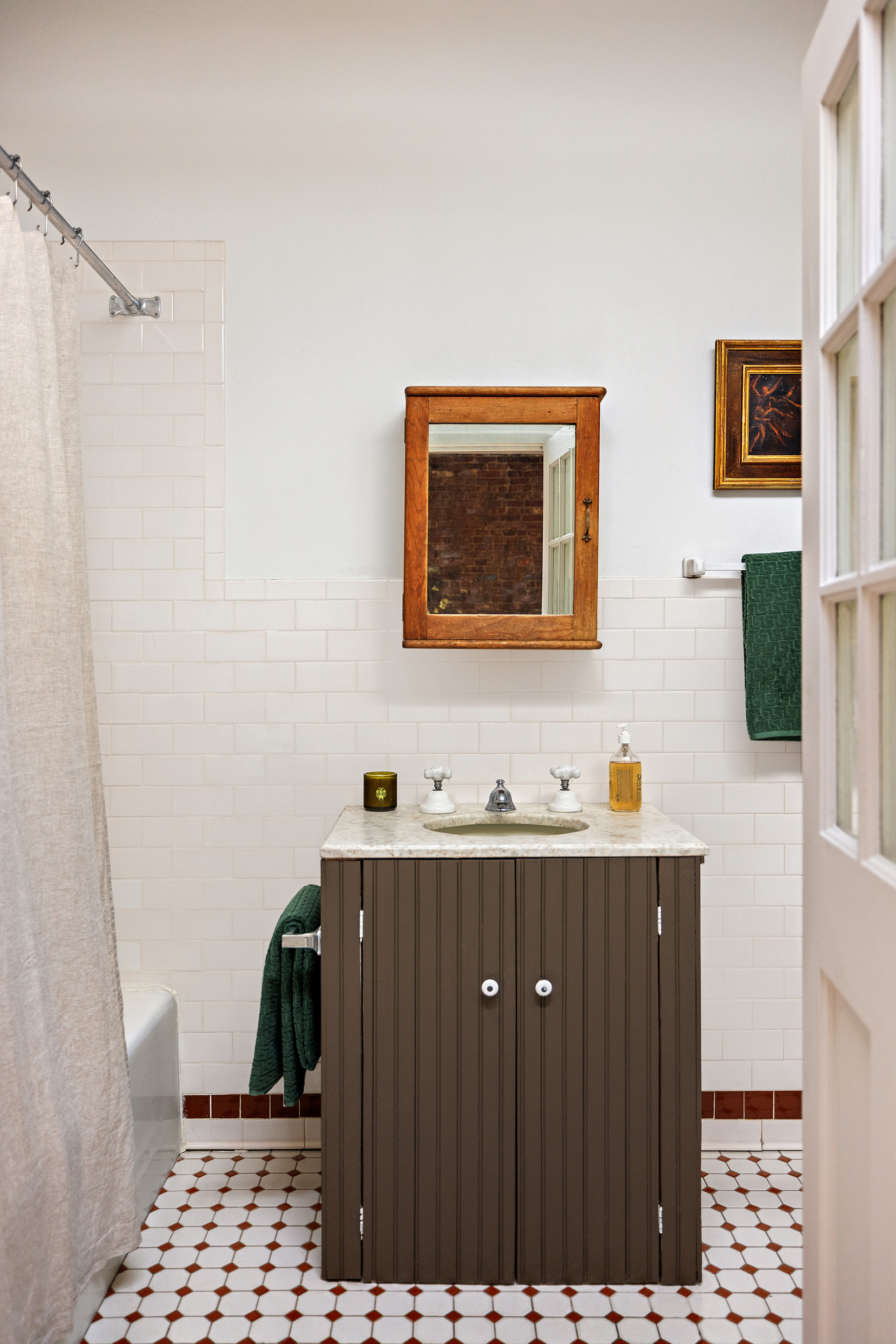 47 Howard Street, Unit PH Manhattan, NY 10013 - Photo 13 of 14 a bathroom with a sink and a mirror