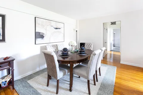 a view of a dining room with furniture