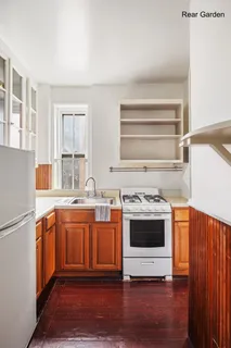 a kitchen with stainless steel appliances granite countertop a stove and a sink