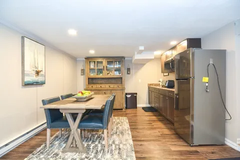 a view of a dining room with furniture