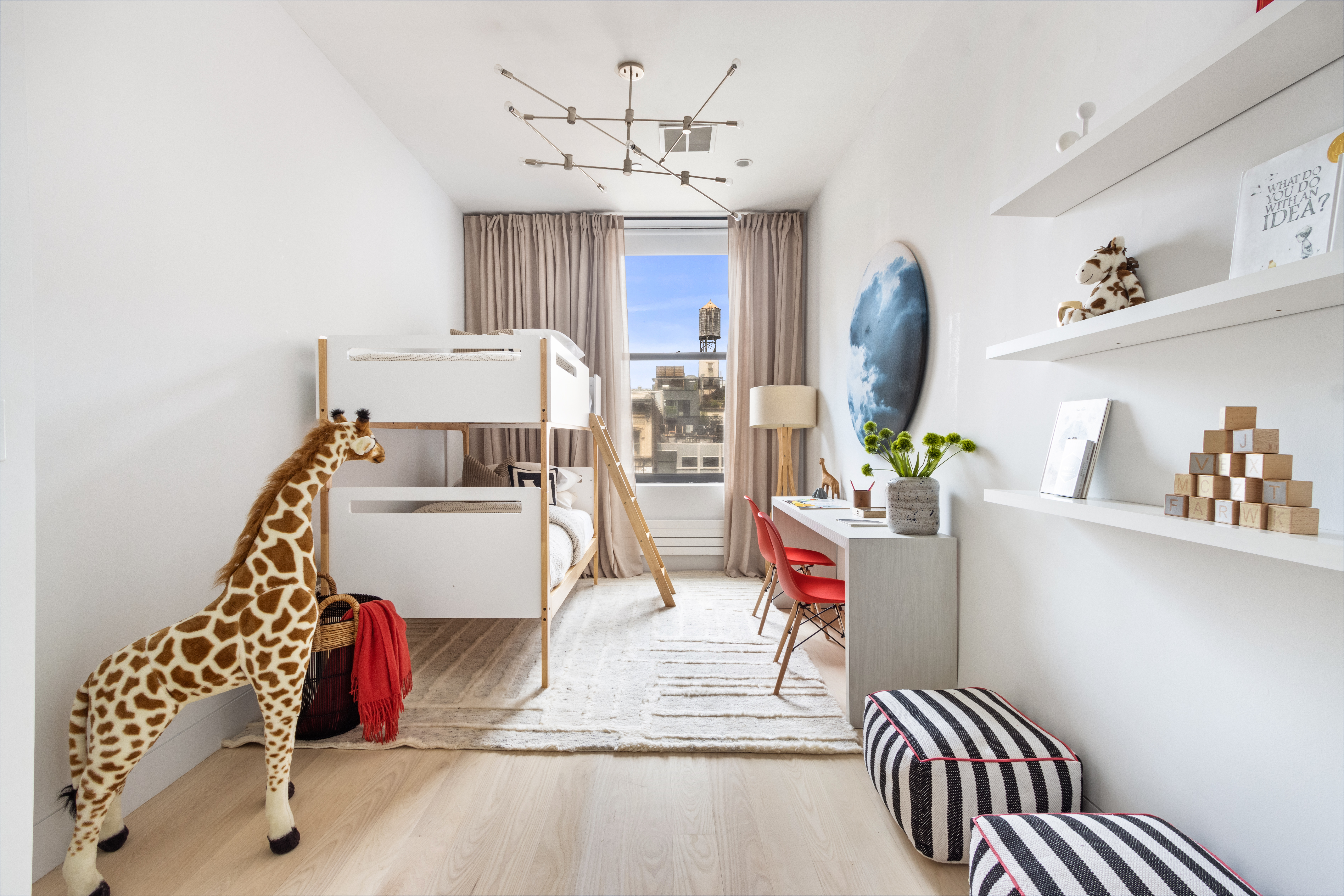 85 Leonard Street, Unit PH Manhattan, NY 10013 - Photo 14 of 27 a living room with patio furniture and wooden floor