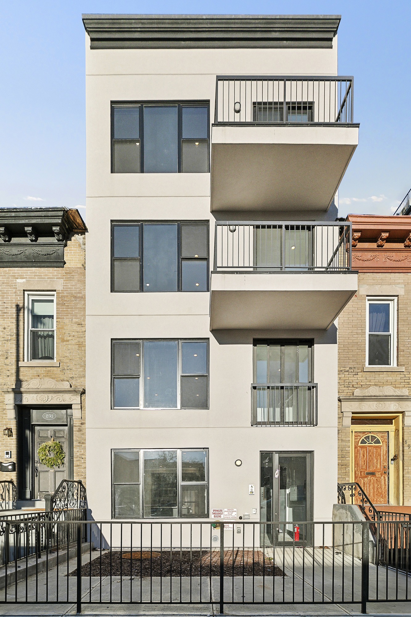 893 Knickerbocker Avenue, Unit 2 Brooklyn, NY 11207 - Photo 10 of 11 a front view of a house with a window