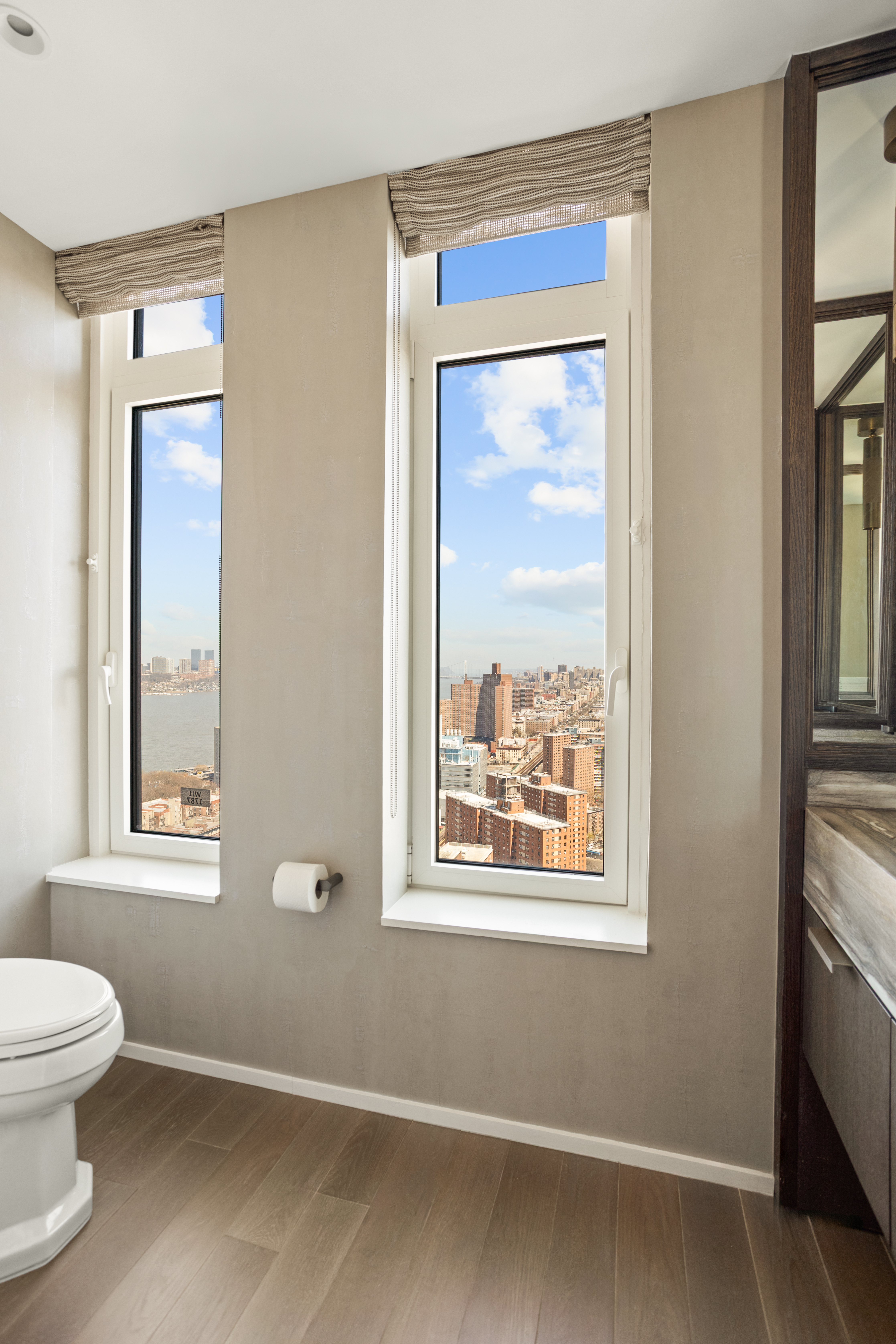 543 West 122nd Street, Unit PH31A Manhattan, NY 10027 - Photo 17 of 40 a bathroom with a toilet sink and window