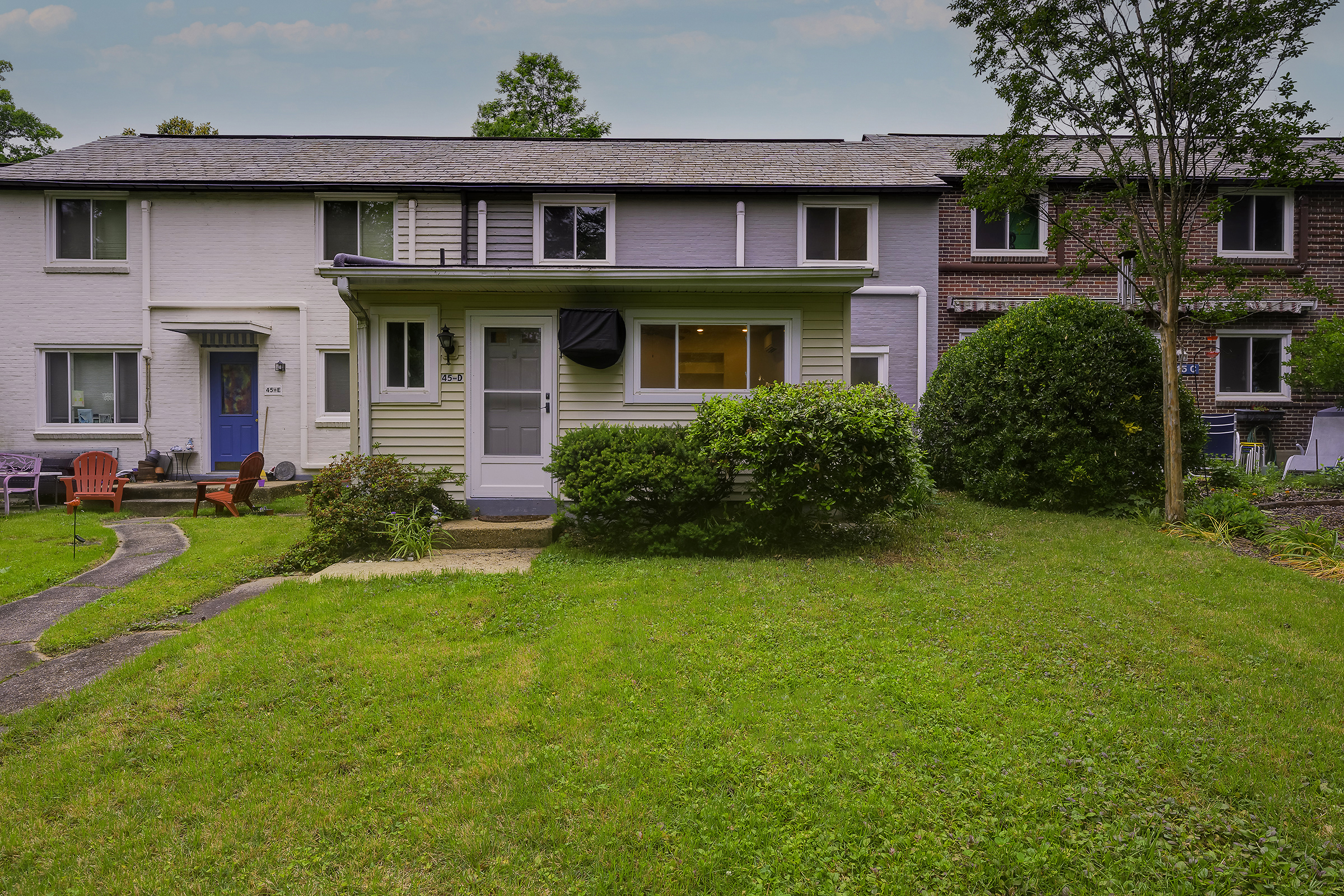 45 D Ridge Road Greenbelt, MD 20770 - Photo 1 of 35 a front view of a house with garden
