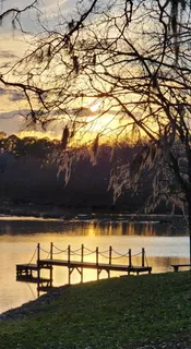 a view of swimming pool with lake view and mountain view