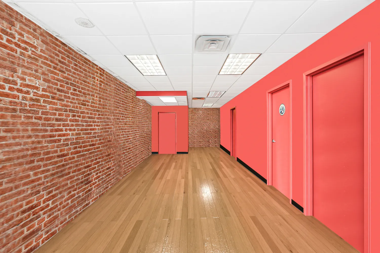 a view of a workspace with furniture