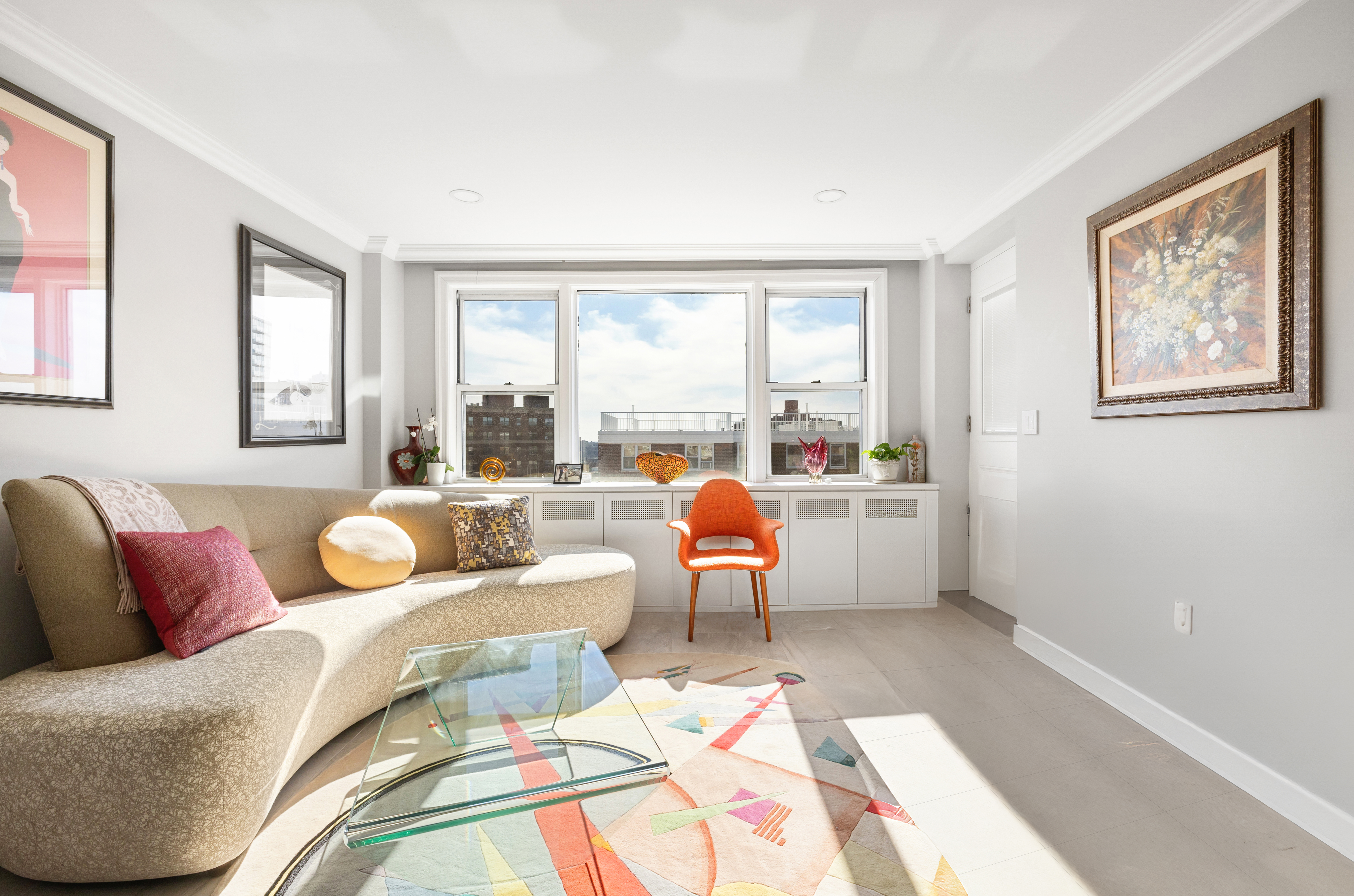 3755 Henry Hudson Parkway West, Unit PHA Bronx, NY 10463 - Photo 5 of 14 a living room with furniture and a large window