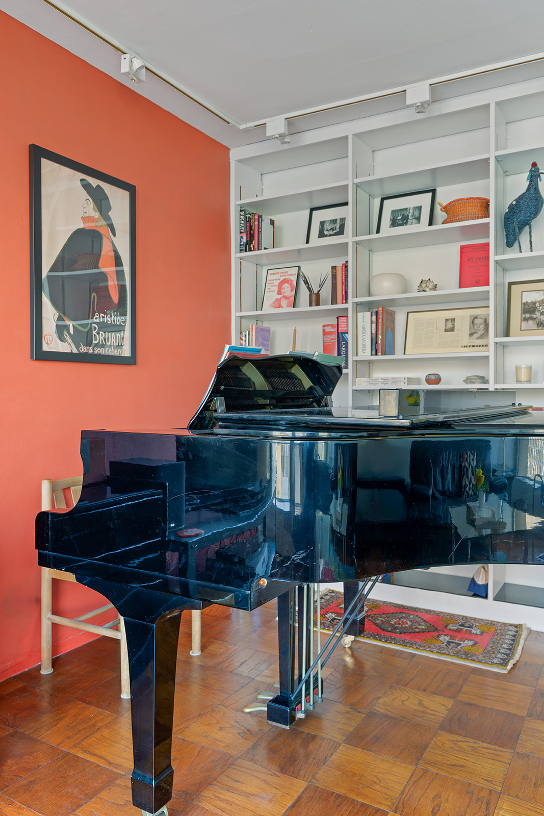 343 East 30th Street, Unit 12M Manhattan, NY 10016 - Photo 2 of 9 a living room with furniture and a piano