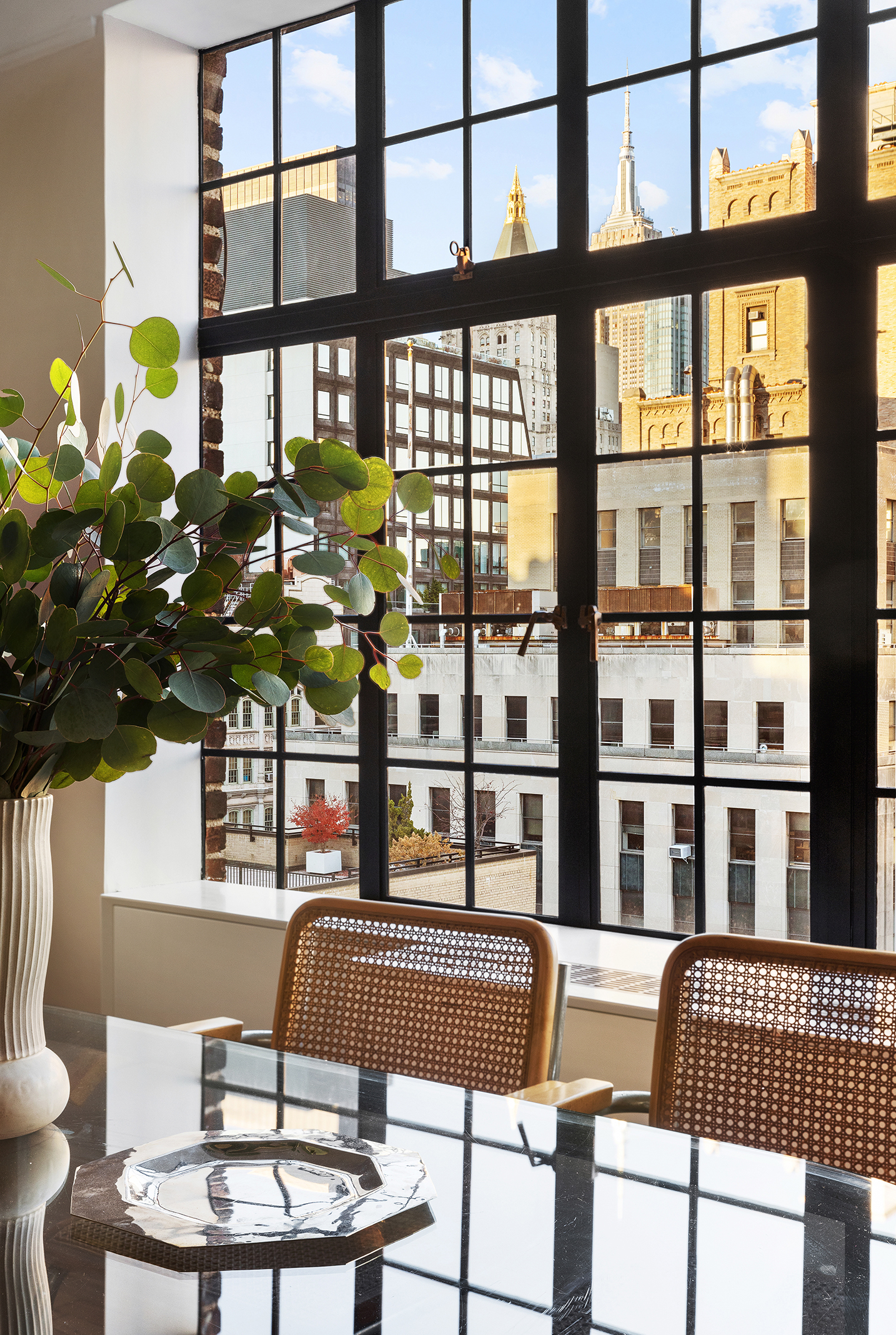 44 Gramercy Park North, Unit 15D Manhattan, NY 10010 - Photo 5 of 11 a table room with furniture and a potted plant