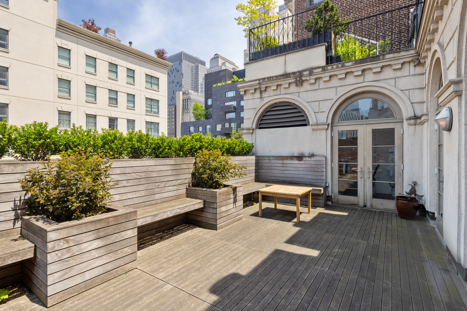 41 Warren Street, Unit 6 Manhattan, NY 10007 - Photo 22 of 23 a front view of a building with outdoor seating