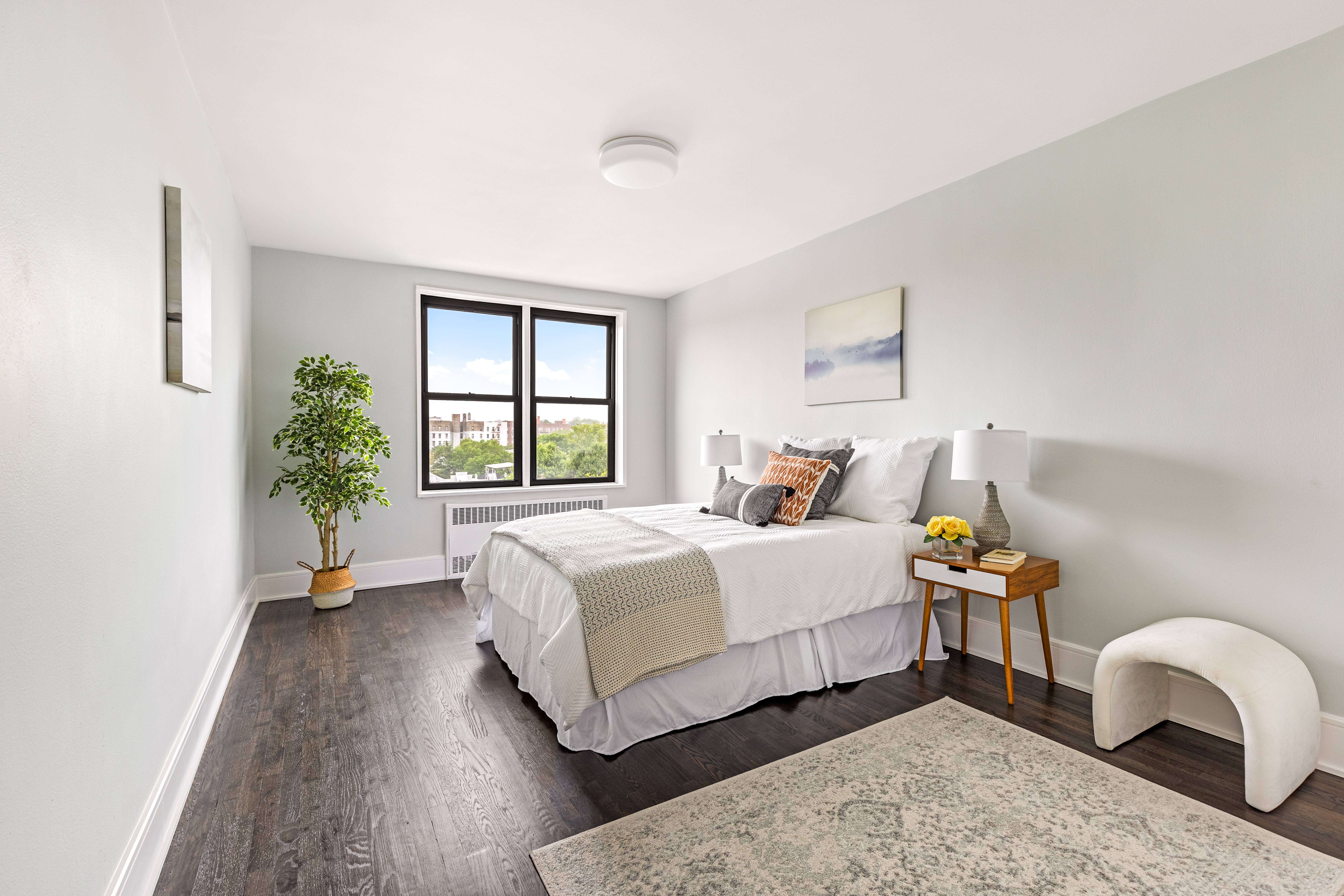 160 Ocean Parkway, Unit 6C Brooklyn, NY 11218 - Photo 5 of 9 a bedroom with a bed and a window