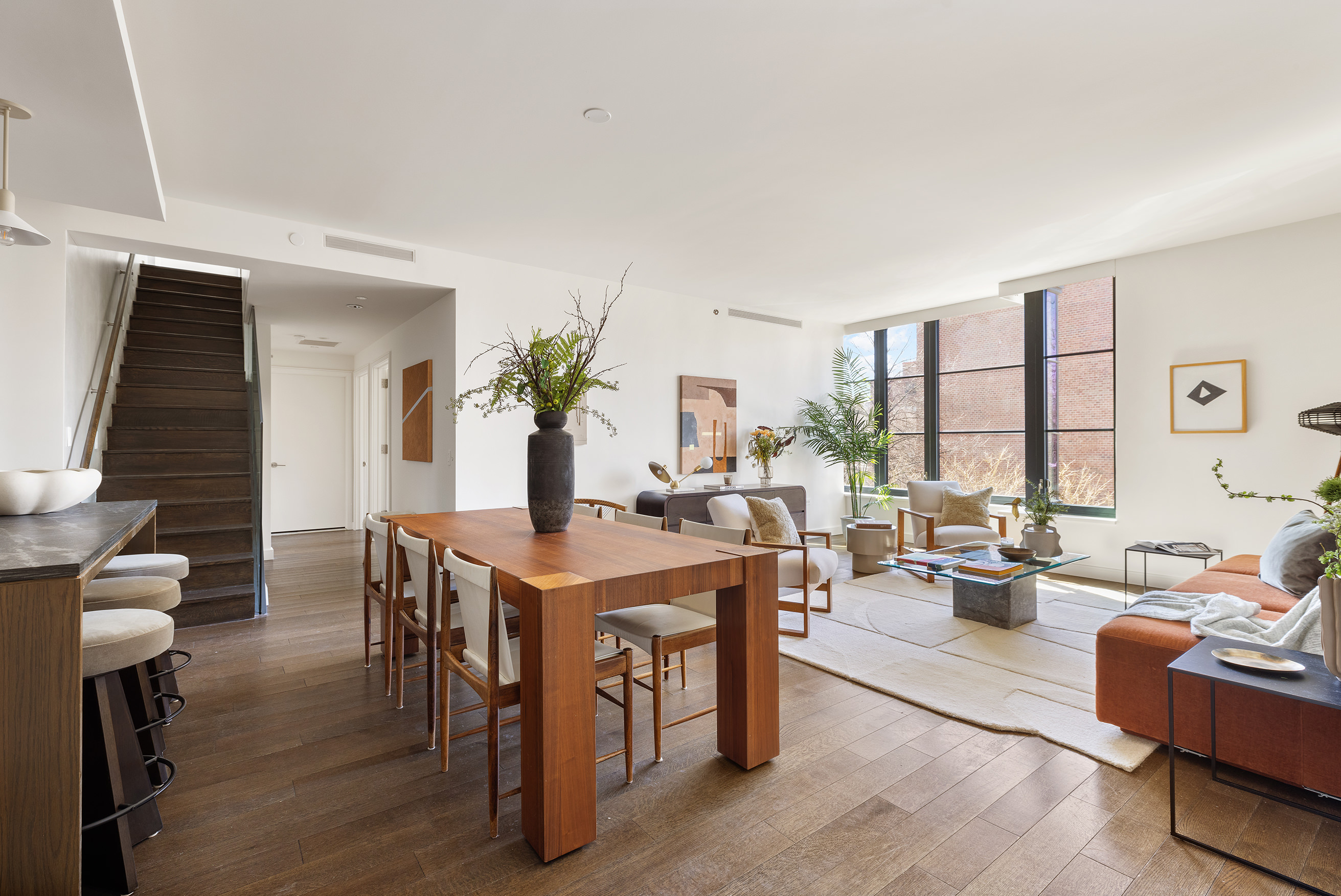 345 Carroll Street, Unit 4B Brooklyn, NY 11231 - Photo 2 of 16 a view of a dining room with furniture window and wooden floor