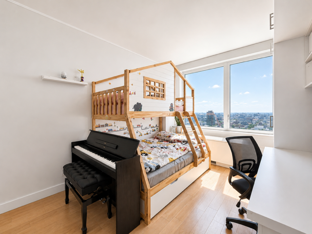 22 North 6th Street, Unit 23K Brooklyn, NY 11249 - Photo 7 of 11 a view of a workspace with furniture and a window