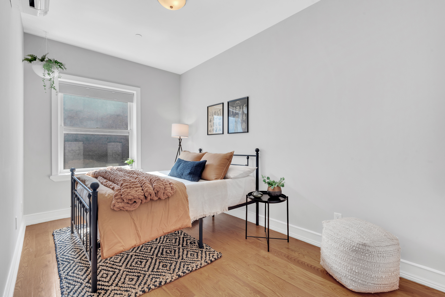 94 Lefferts Place, Unit 2 Brooklyn, NY 11238 - Photo 7 of 10 a bedroom with a bed and wooden floor