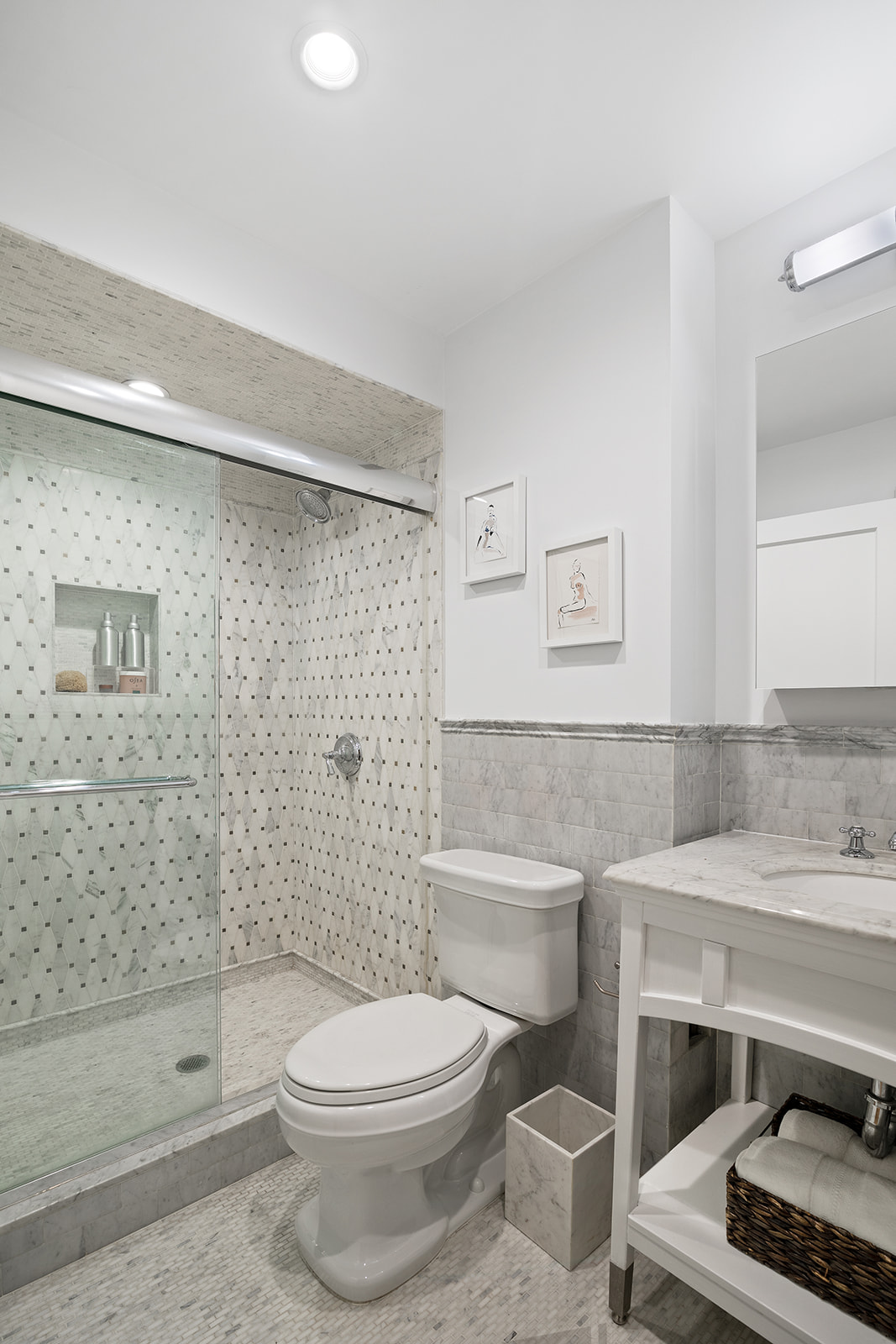 57 East 75th Street, Unit 2F Manhattan, NY 10021 - Photo 8 of 10 a bathroom with a sink toilet and shower