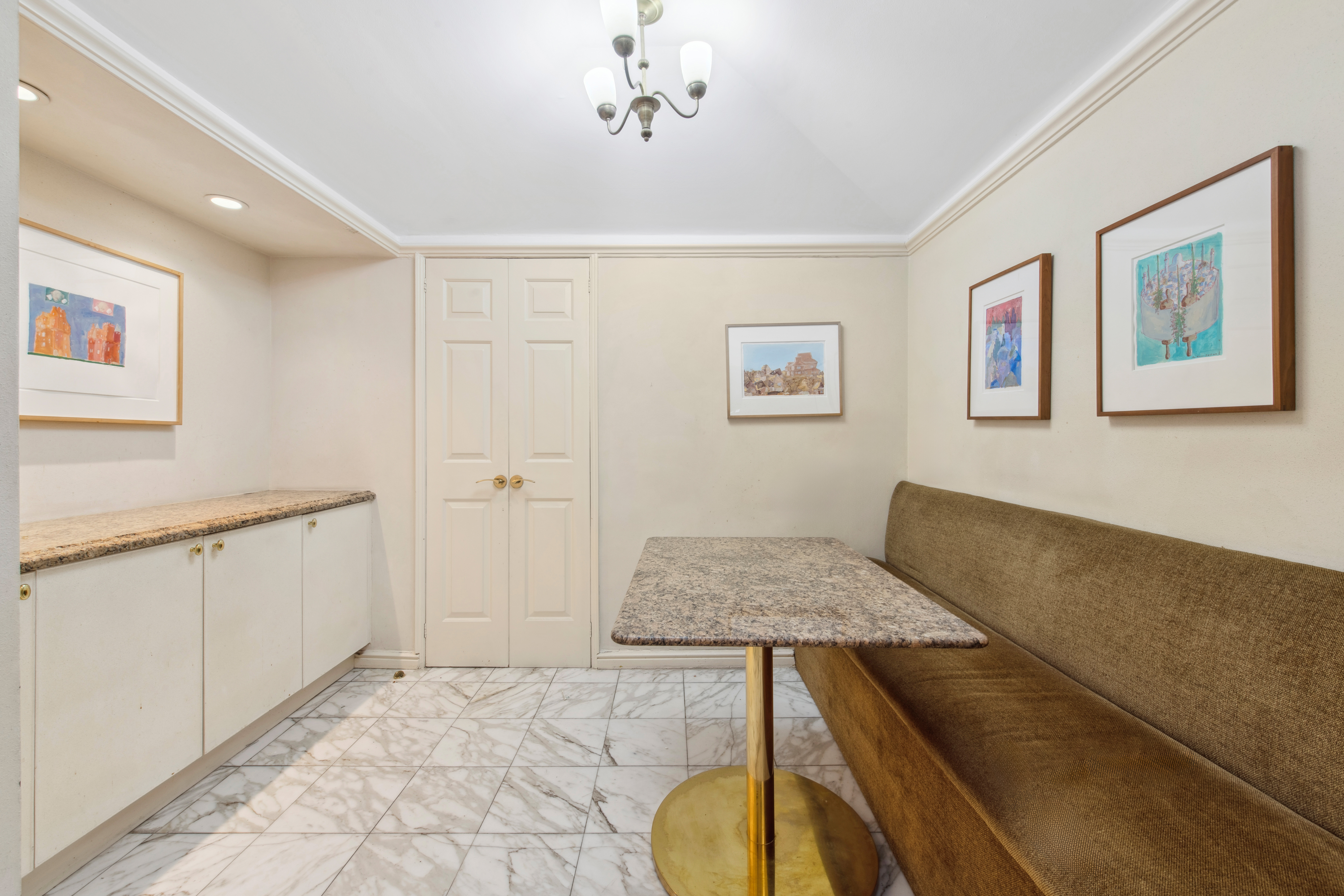 2 Sutton Place South, Unit 7F Manhattan, NY 10022 - Photo 6 of 18 a living room with furniture and a dining table