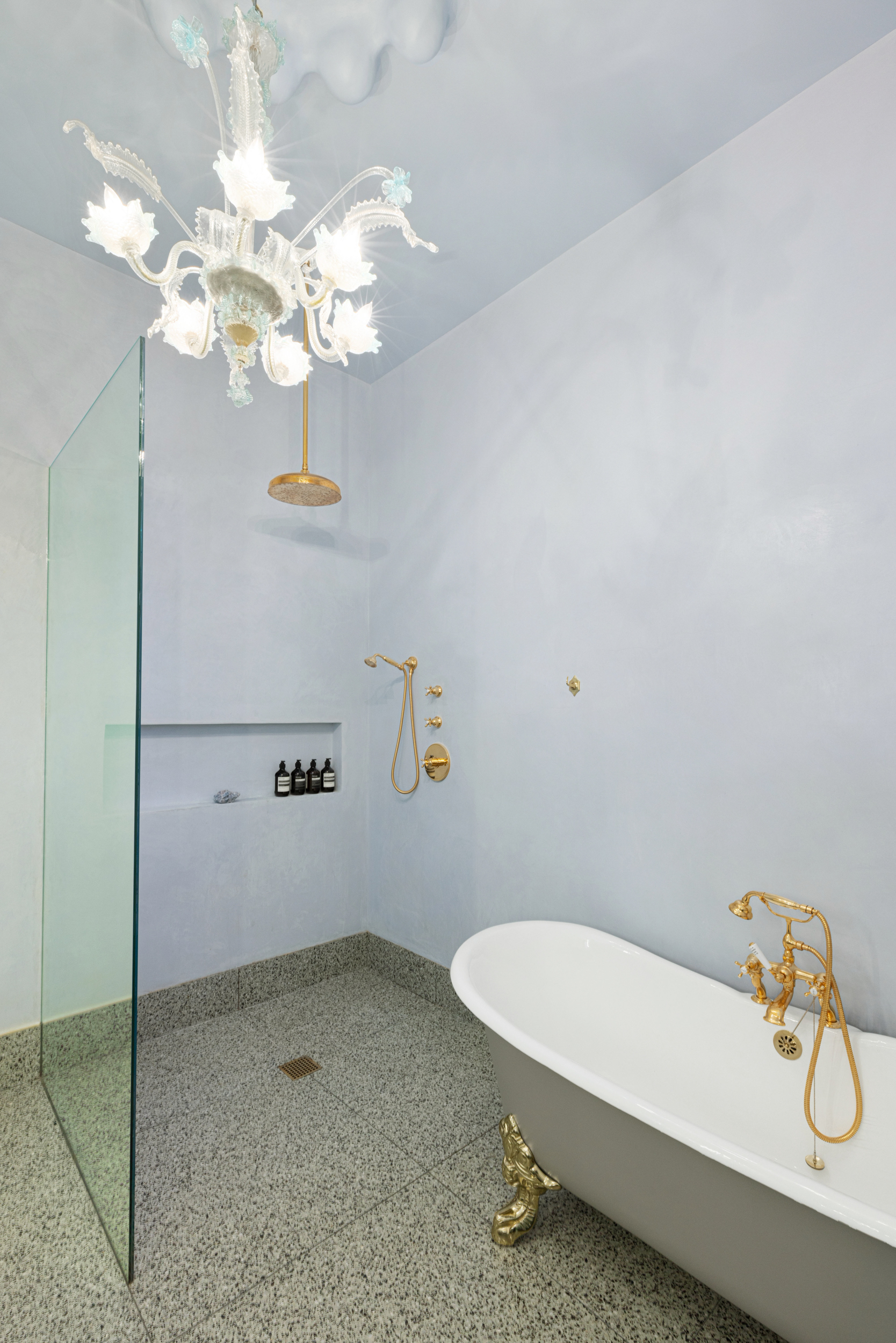 55 Walker Street, Unit 3A Manhattan, NY 10013 - Photo 10 of 12 a bathroom with a sink a mirror and a shower