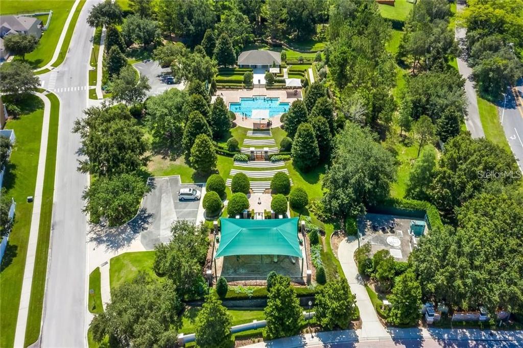 352 Giovani Boulevard Clermont, FL 34715 - Photo 41 of 46 an aerial view of a house with swimming pool and garden