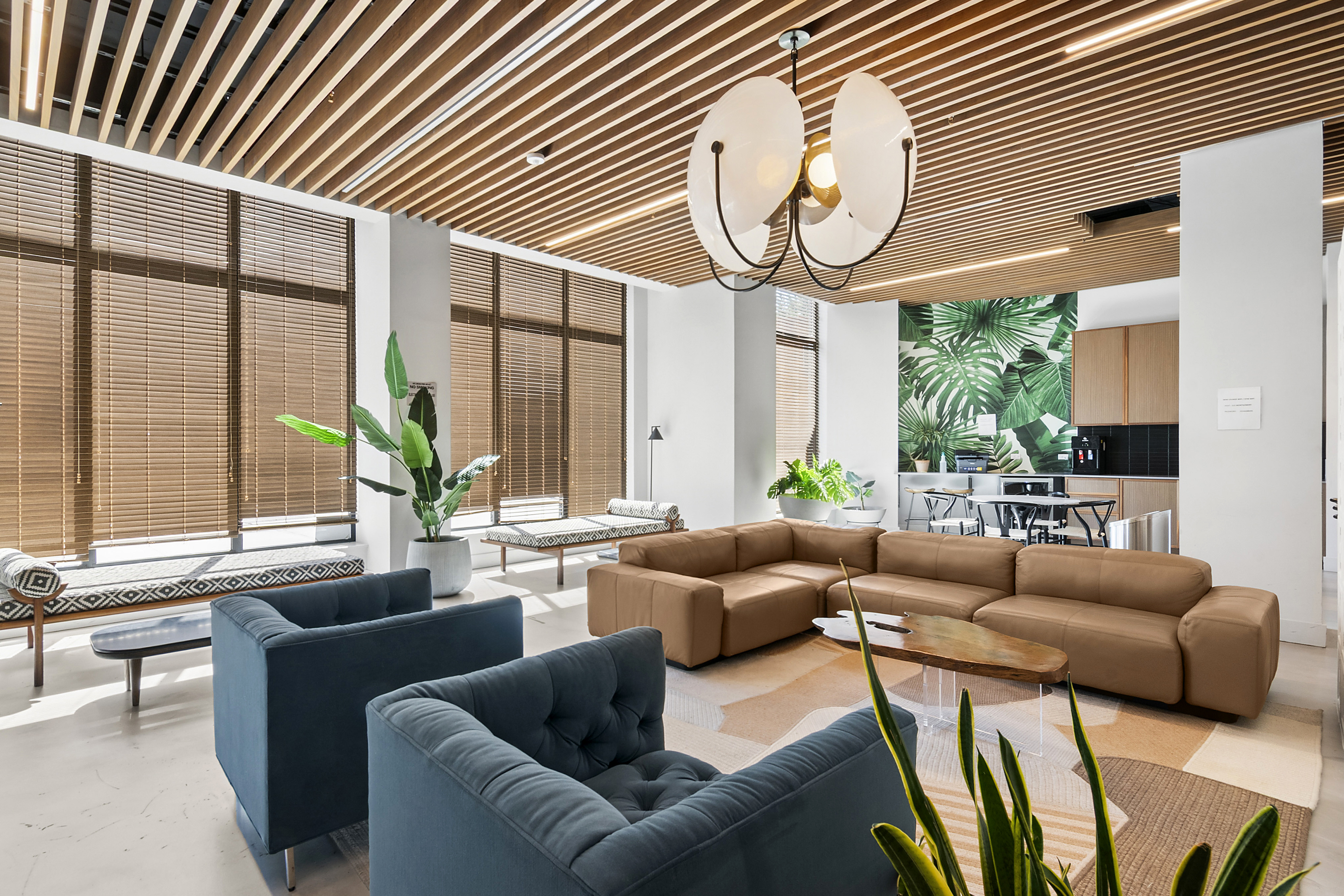111 Montgomery Street, Unit 7C Brooklyn, NY 11225 - Photo 6 of 15 a living room with furniture a large window and a chandelier
