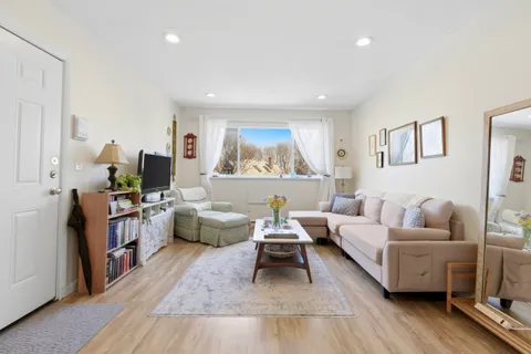 a living room with furniture and a couch