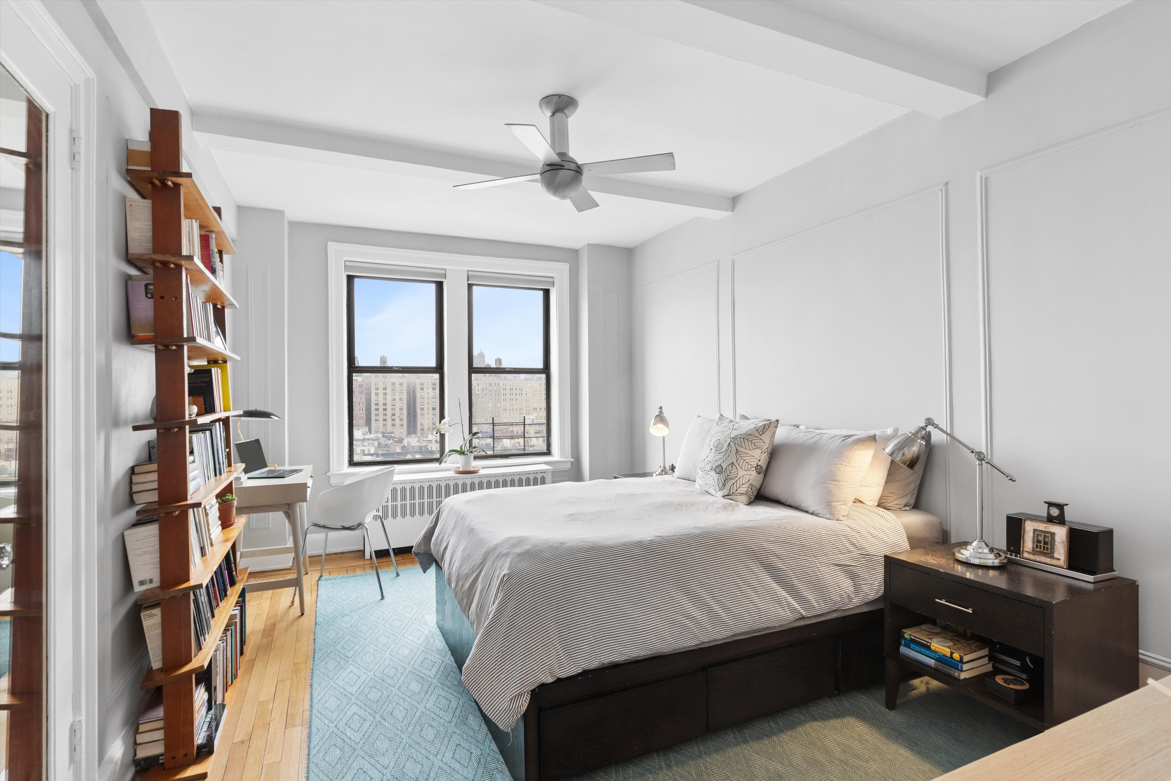41 West 72nd Street, Unit 15E Manhattan, NY 10023 - Photo 7 of 12 a bedroom with a bed furniture and a window