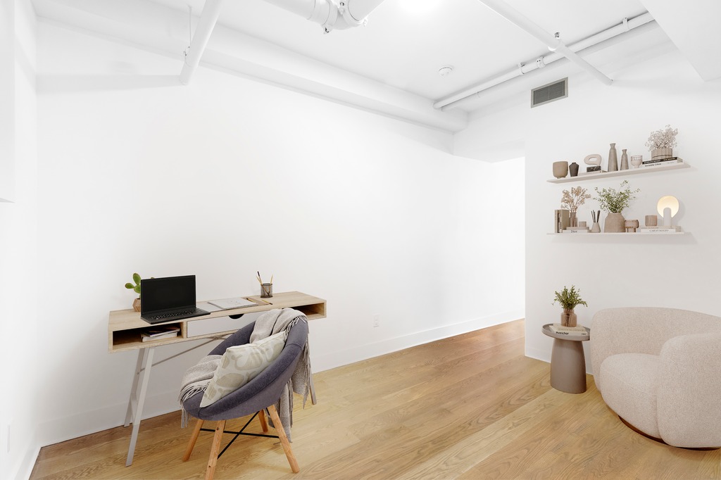 133 Mulberry Street, Unit 5A Manhattan, NY 10013 - Photo 7 of 15 a view of a workspace with furniture