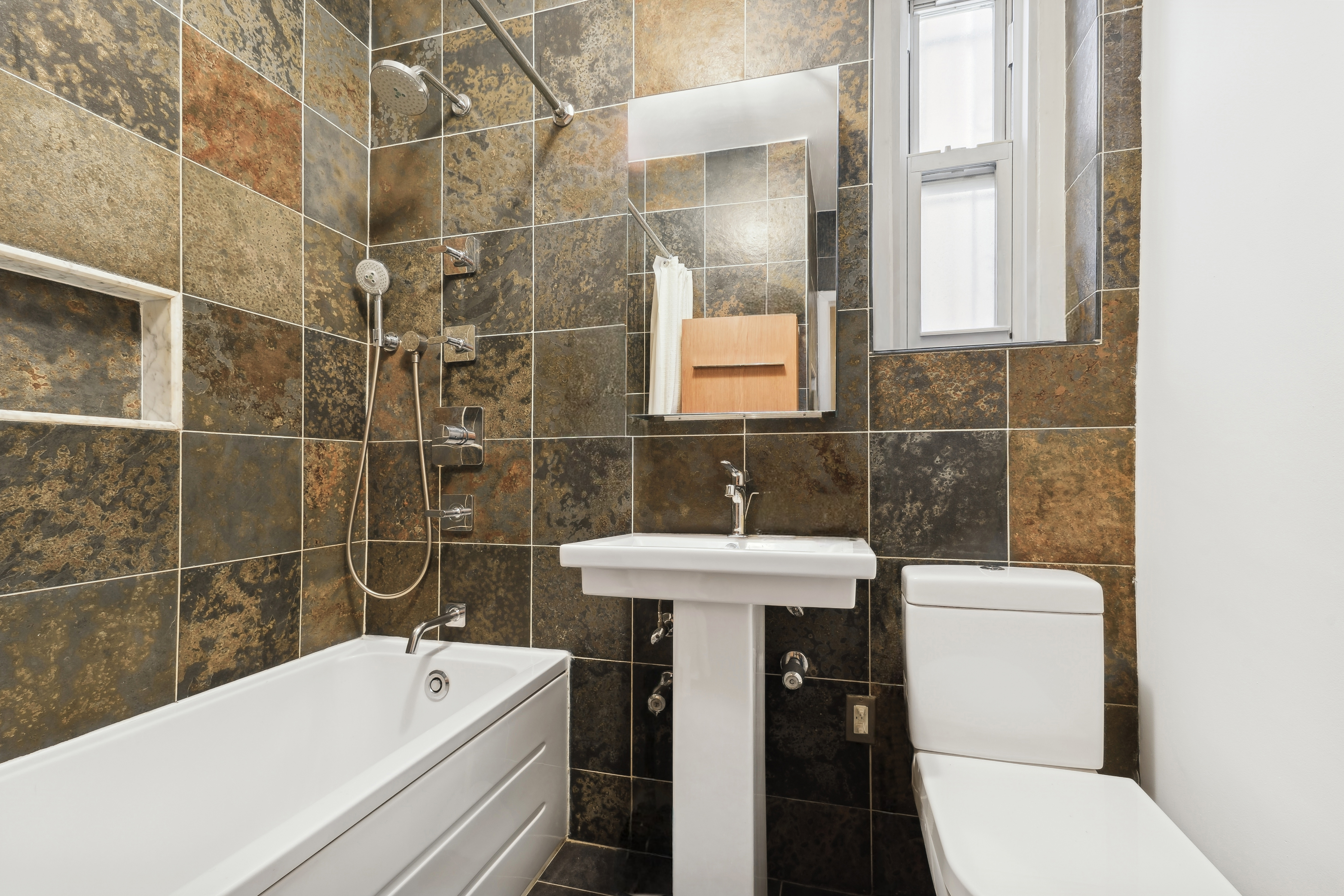 44 Prospect Park West, Unit A1 Brooklyn, NY 11215 - Photo 8 of 9 a bathroom with a sink a toilet and bathtub