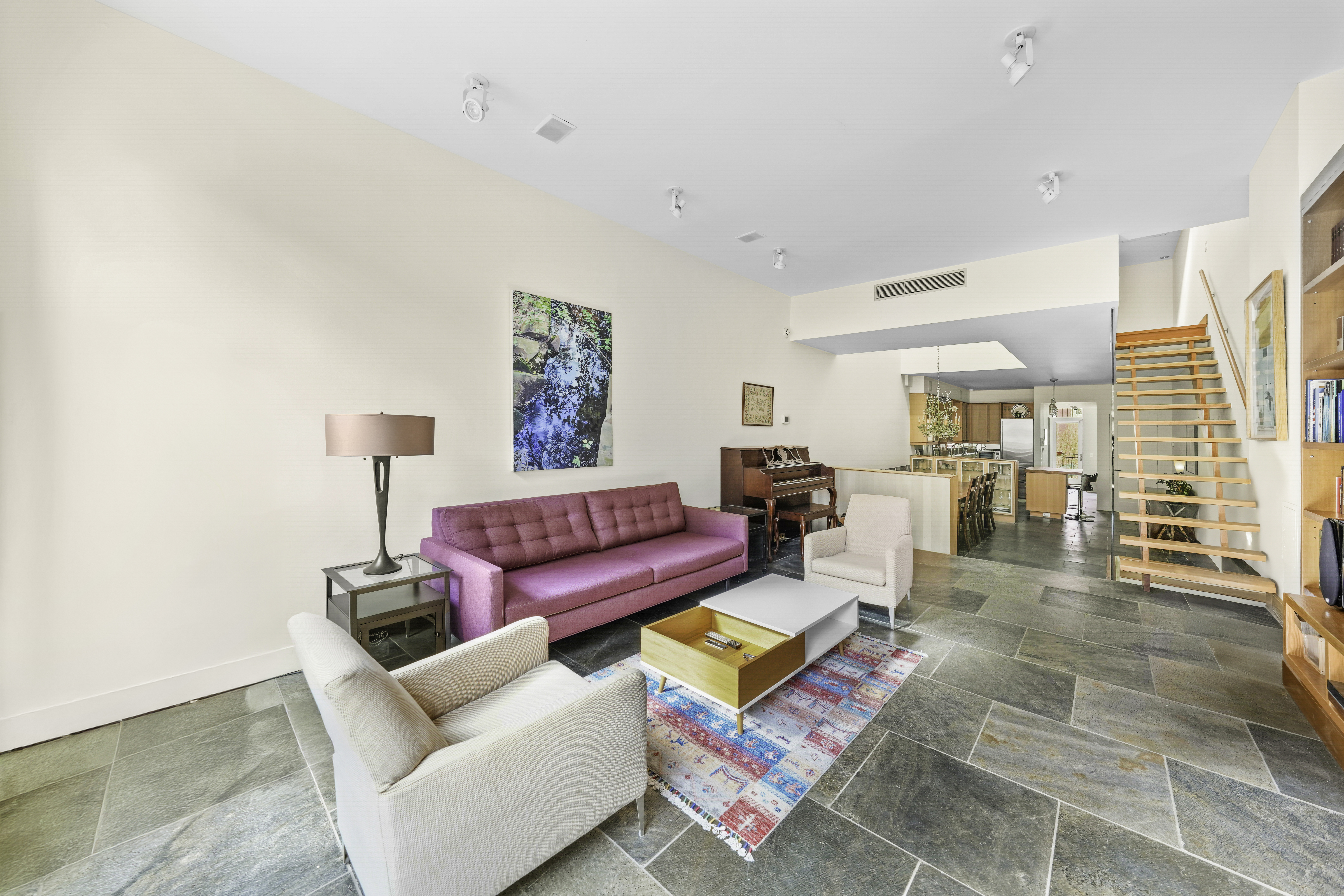 133 West 123rd Street Manhattan, NY 10027 - Photo 1 of 31 a living room with furniture