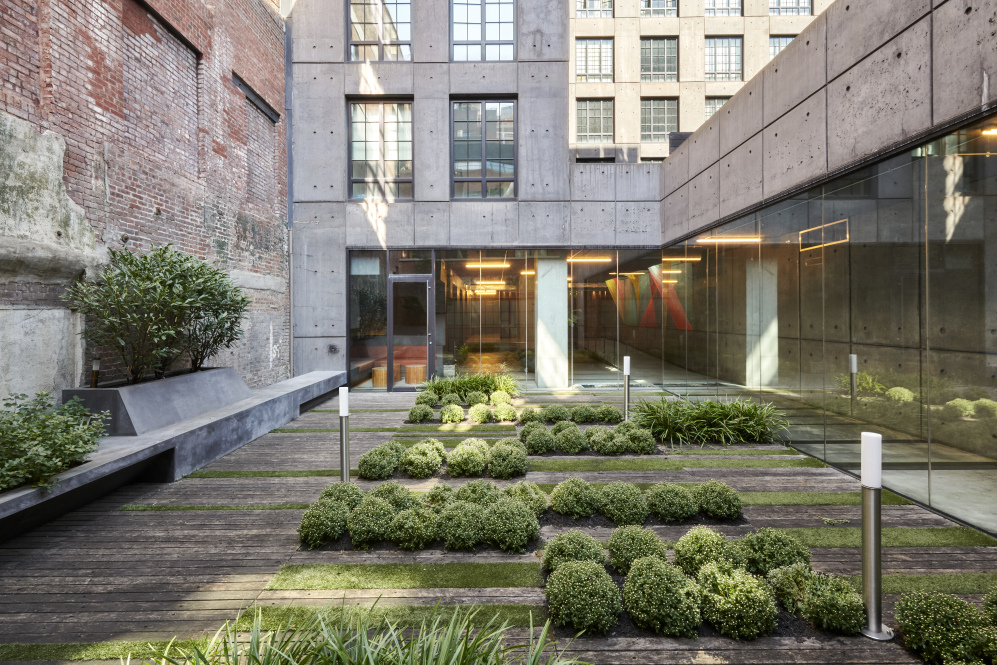 205 Water Street, Unit 2E Brooklyn, NY 11201 - Photo 10 of 12 a front view of a building with garden