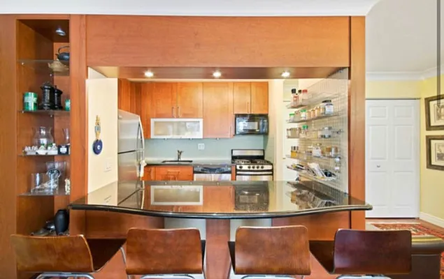510 East 80th Street, Unit 4D Manhattan, NY 10075 - Photo 14 of 20 view of living room with furniture and window