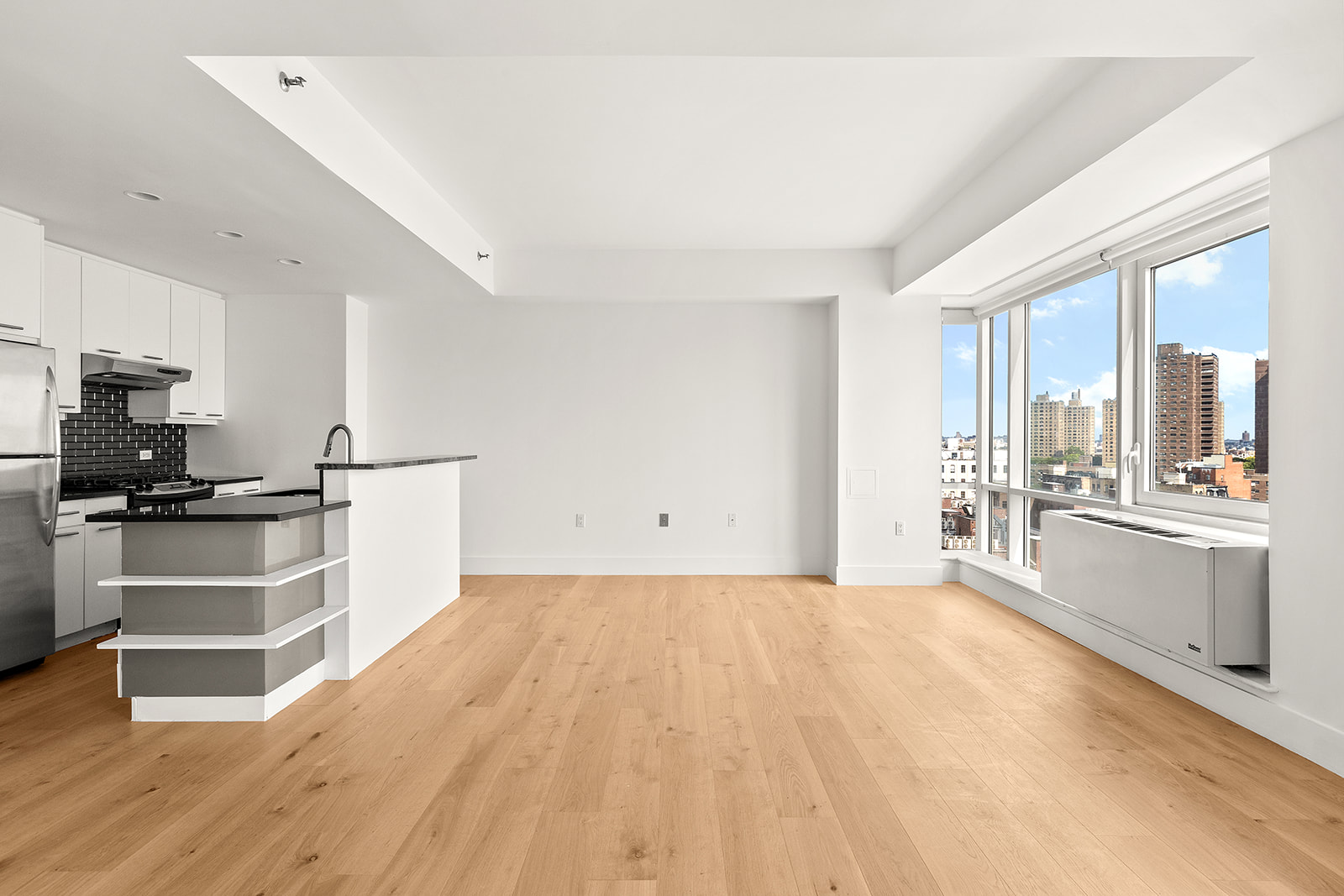 446 Kent Avenue, Unit PHC Brooklyn, NY 11249 - Photo 4 of 22 a view of a kitchen with electric appliances