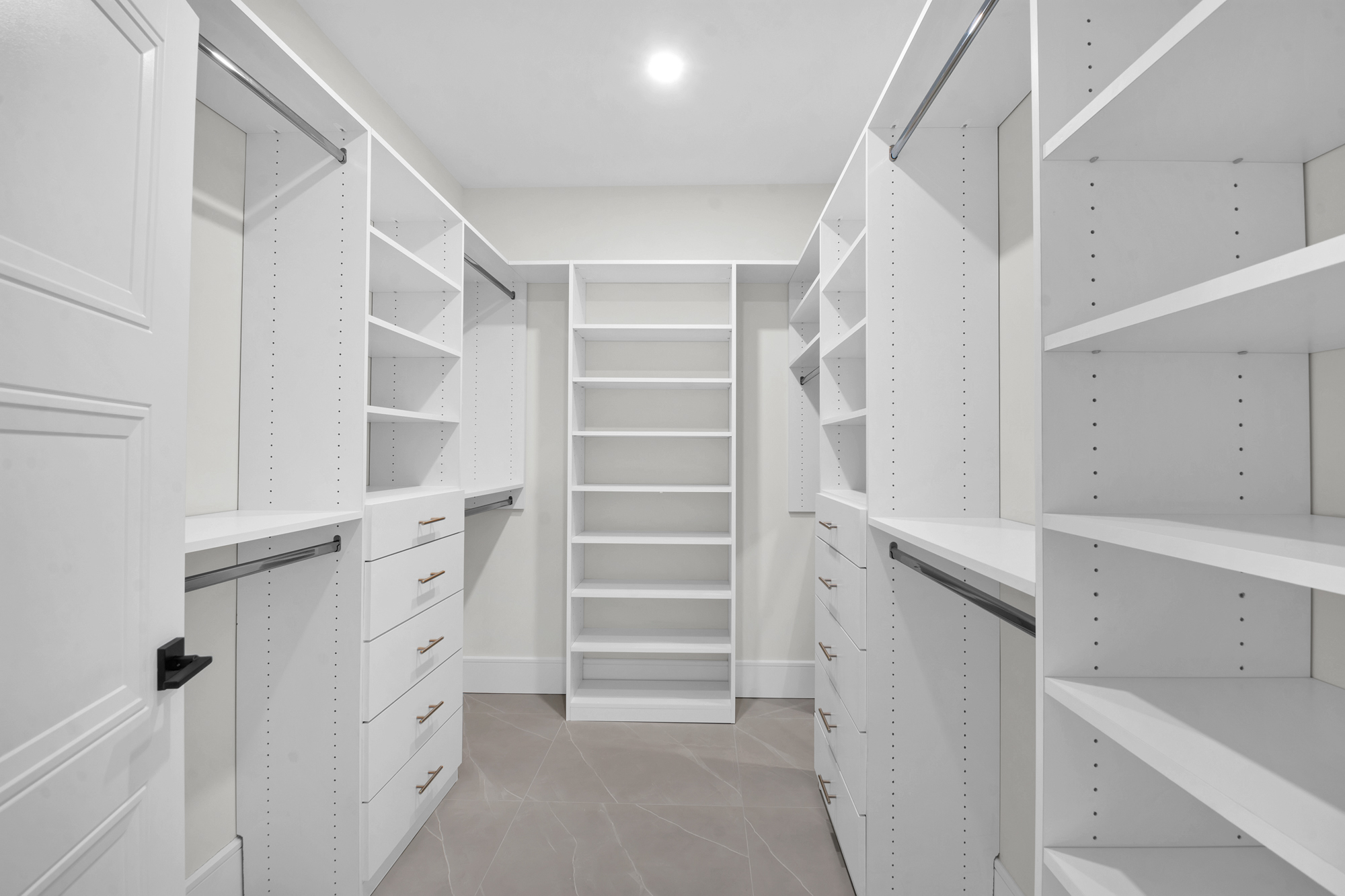 5 Osprey Court Staten Island, NY 10308 - Photo 22 of 50 a view of walk in closet with empty racks