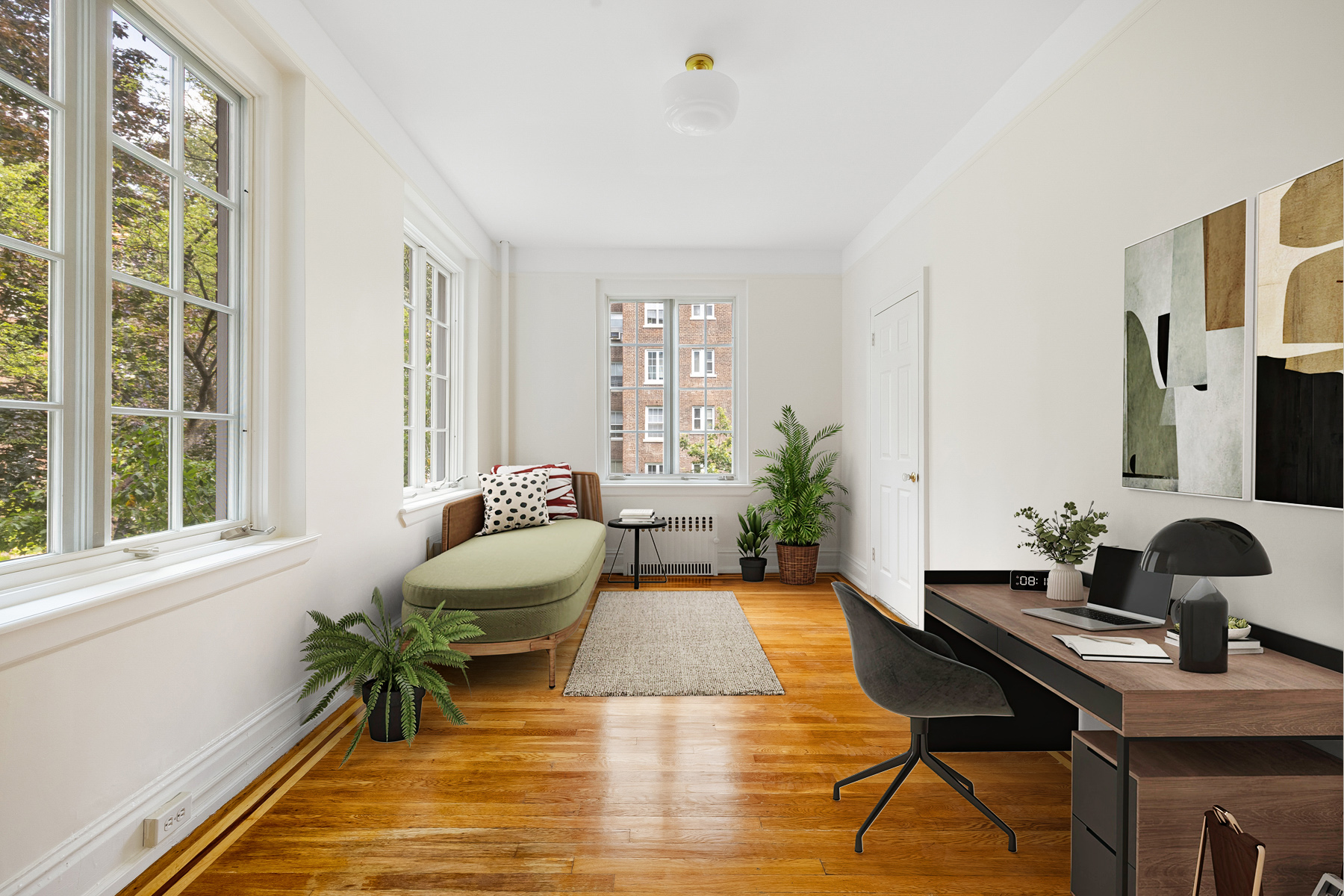 35-27 76th Street, Unit 21 Queens, NY 11372 - Photo 7 of 24 a living room with furniture and a window