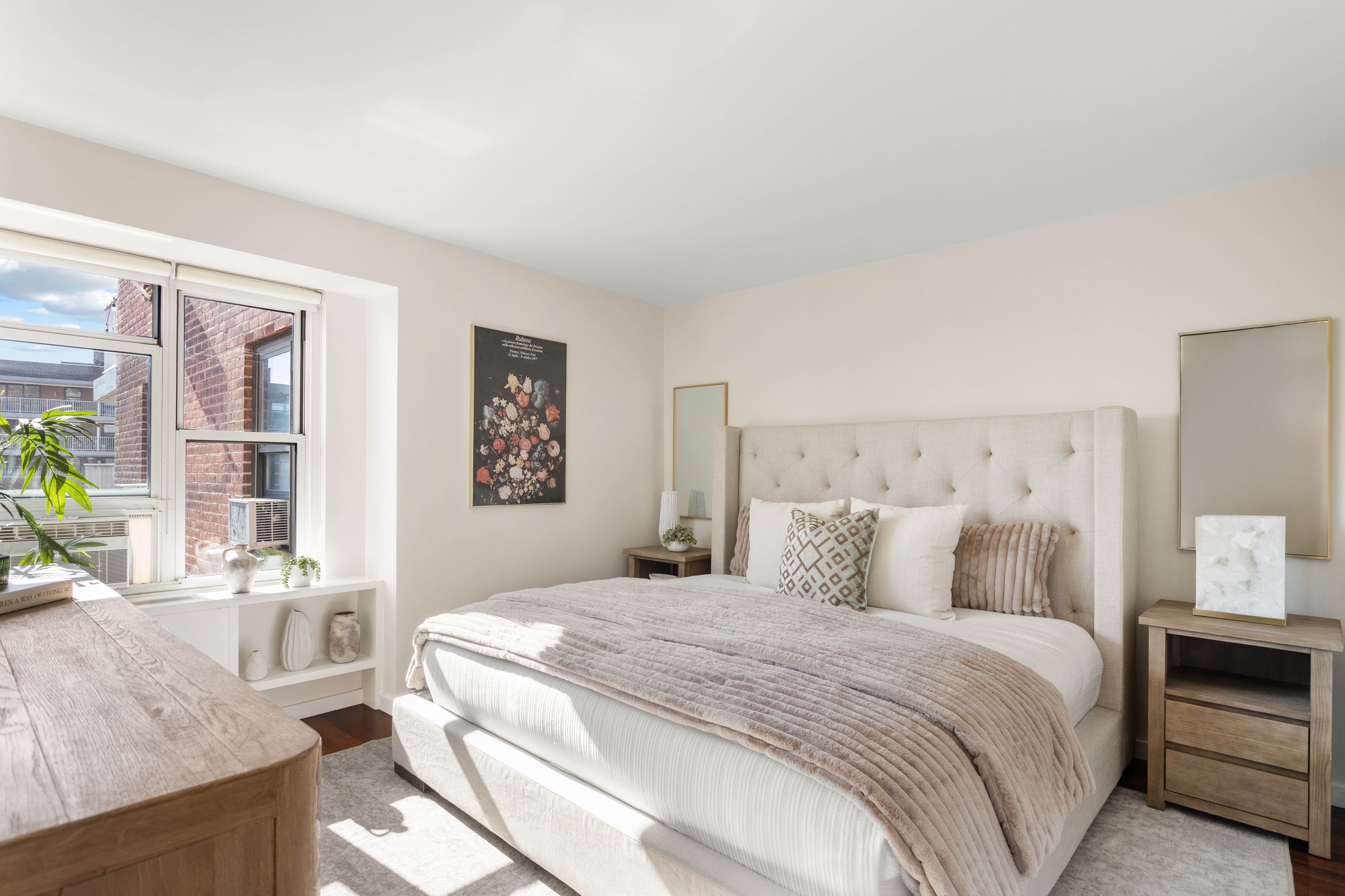 417 Grand Street, Unit D1801 Manhattan, NY 10002 - Photo 7 of 23 a bedroom with a bed and a couch