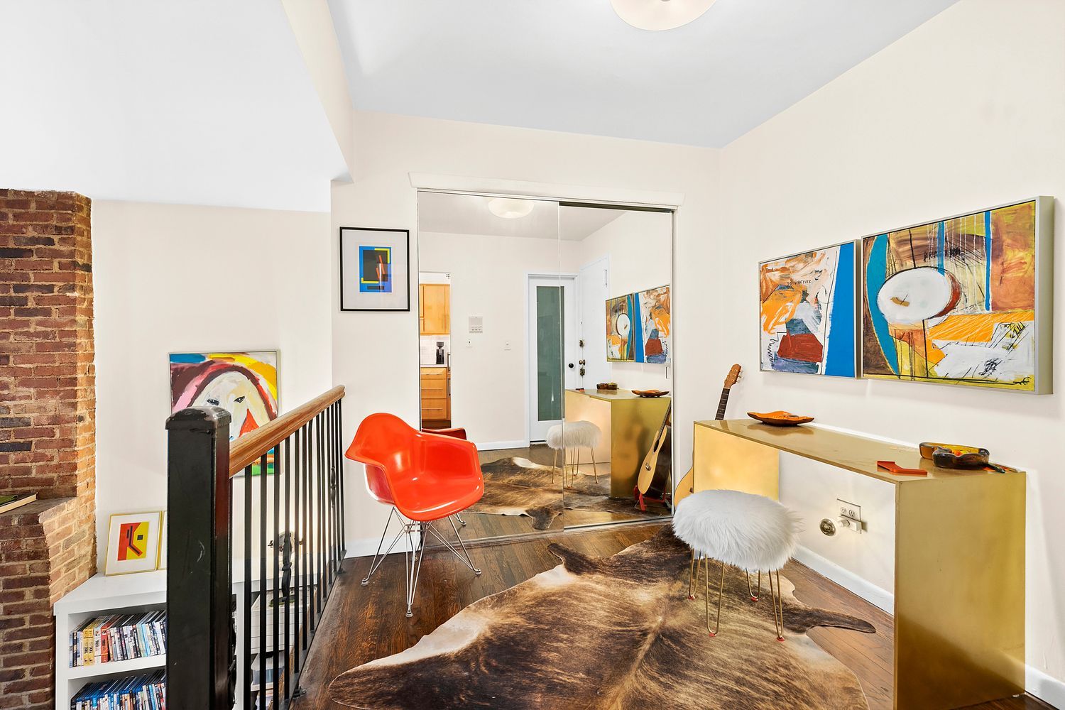 344 West End Avenue, Unit 6 Manhattan, NY 10024 - Photo 3 of 6 a living room with furniture and painting on the wall