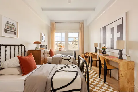 a view of a a dining room with furniture window and outside view