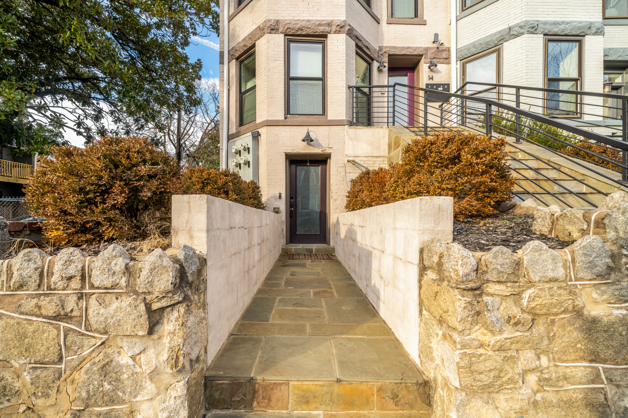 14 T Street Northeast, Unit 1 Washington, DC 20002 - Photo 2 of 39 a view of a brick house with large windows
