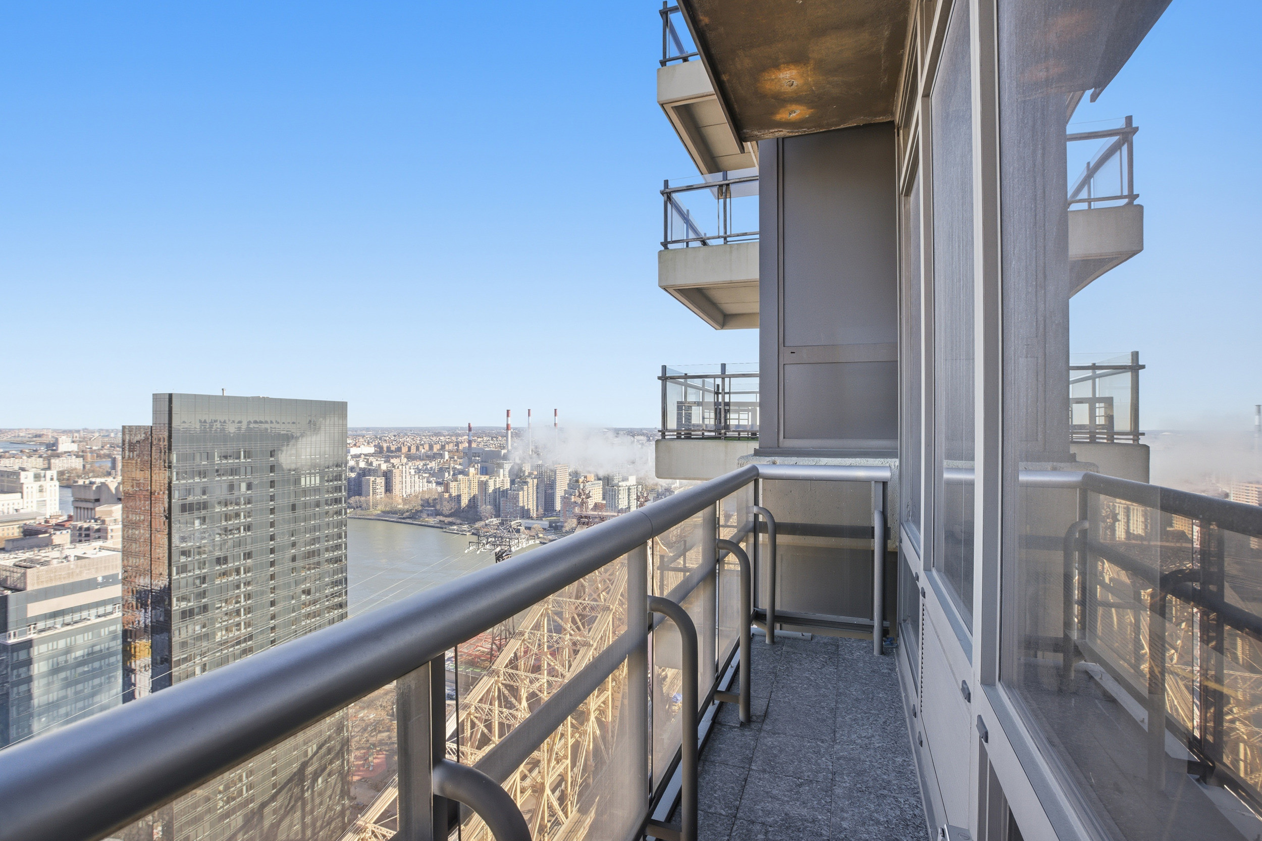 418 East 59th Street, Unit PHA Manhattan, NY 10022 - Photo 6 of 17 a view of city from balcony