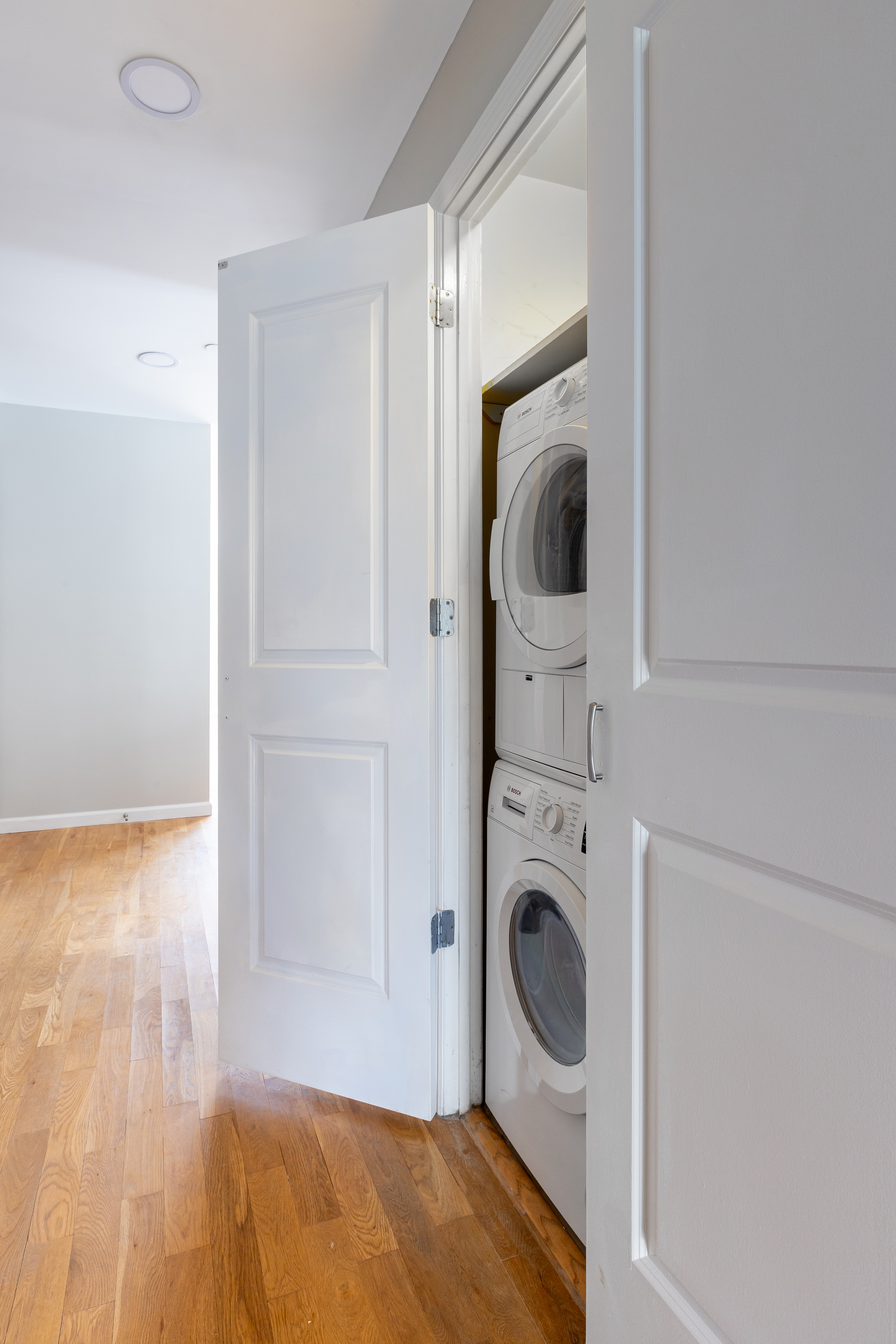 416 East 117th Street, Unit 5A Manhattan, NY 10035 - Photo 11 of 16 a utility room with dryer and washer