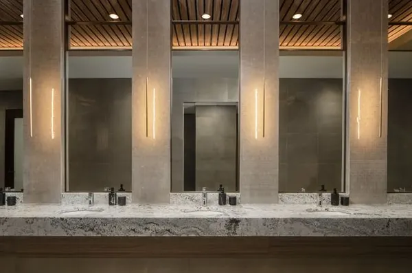 a view of a hallway with chandelier