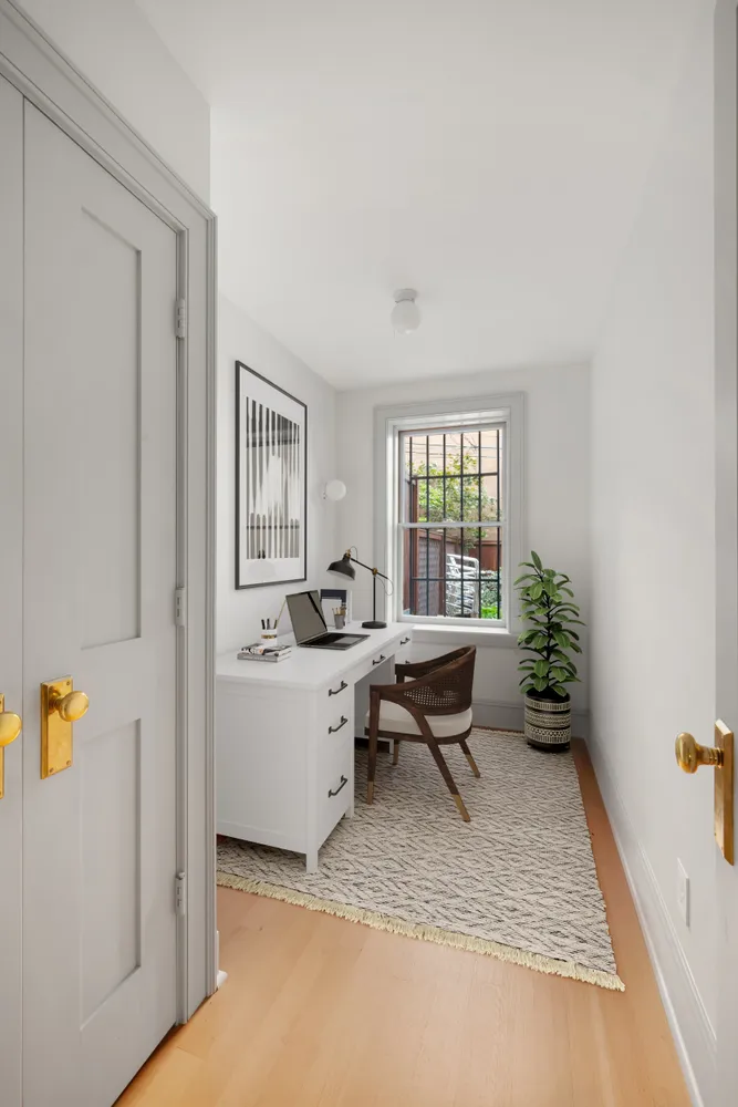 a living room with furniture and window