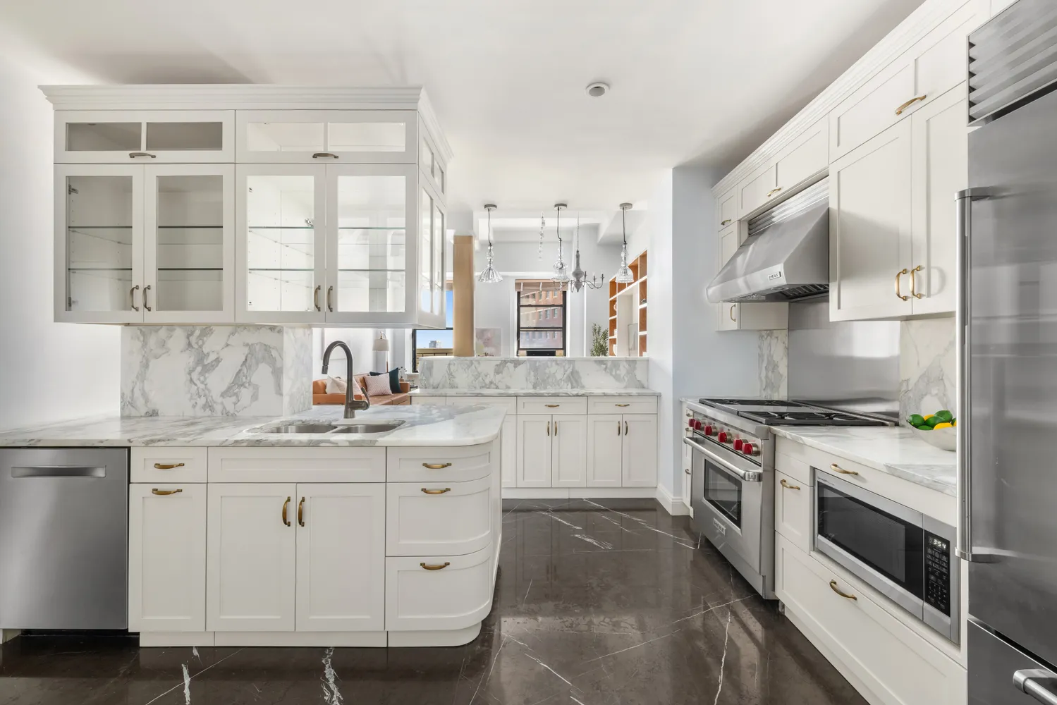 a kitchen with granite countertop white cabinets and white appliances